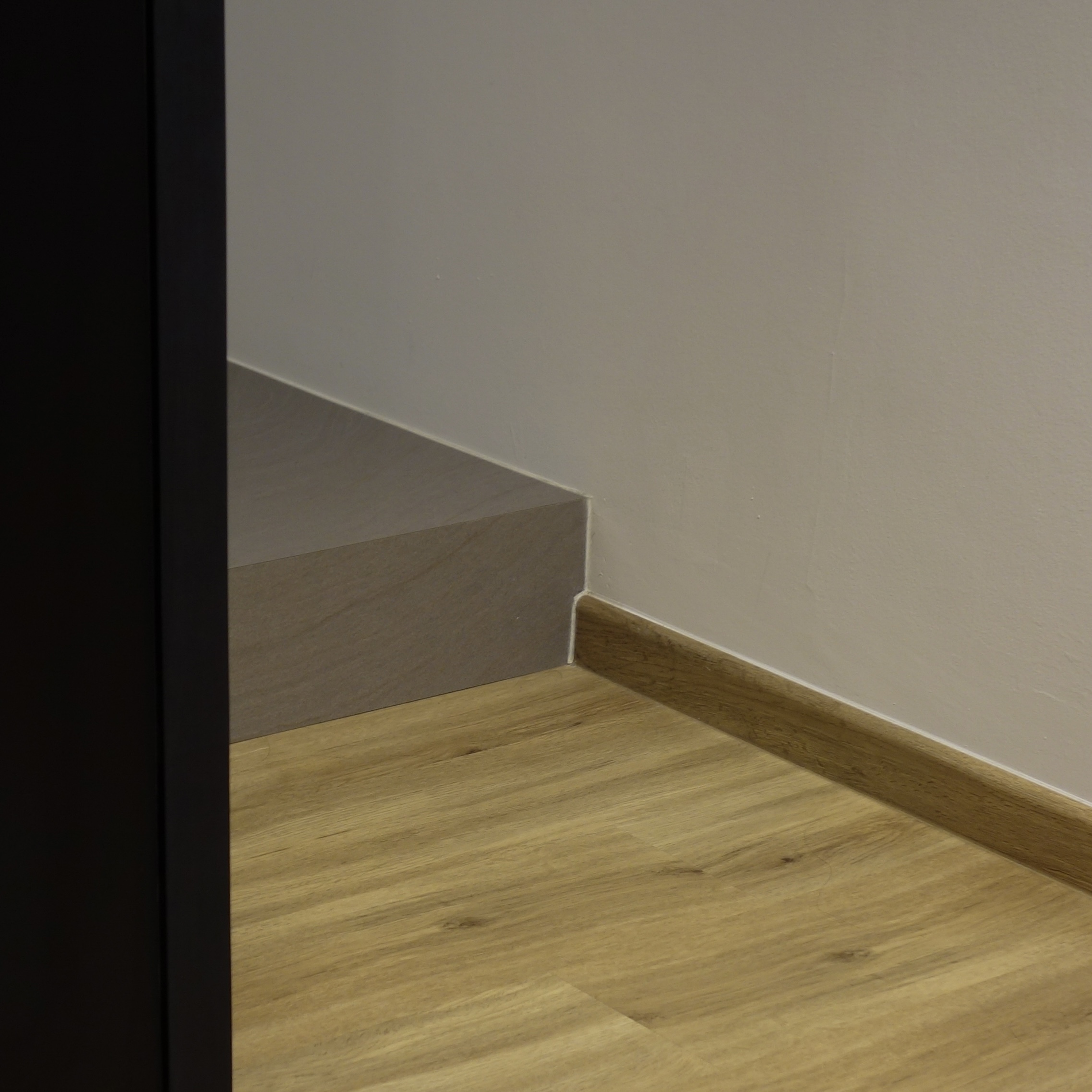 A cozy retreat: The master bedroom - Light wood staircase, minimalist design, modern aesthetic, wooden floor, natural wood