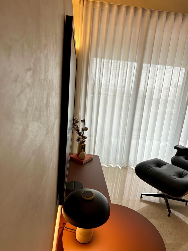 Living room - the space with the most complexity - Modern living room, cozy ambiance, large window, sheer curtains, soft