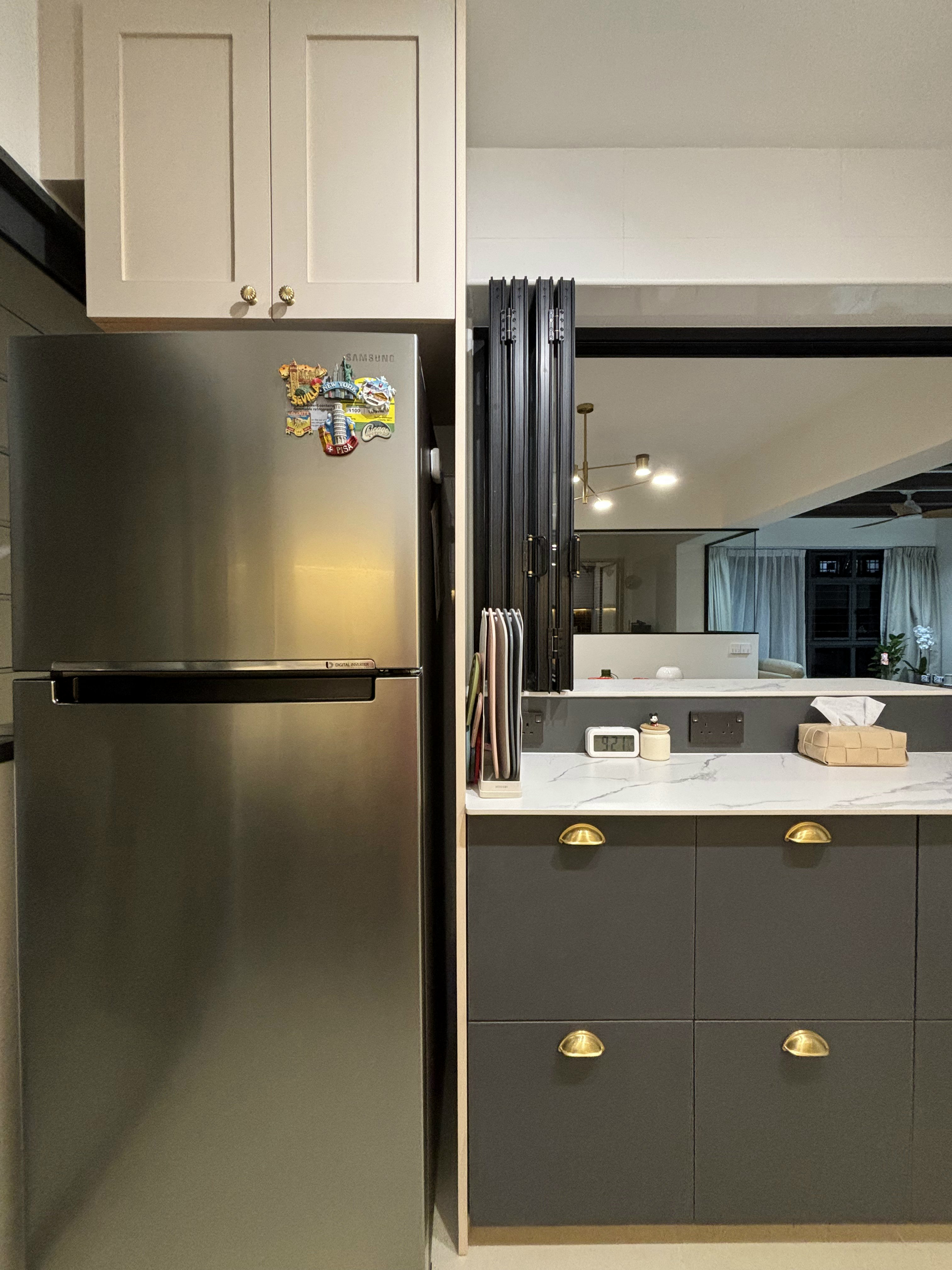 Our Favourite Features in the Kitchen - Stainless steel refrigerator, modern kitchen, dual-door cabinets, minimalist design