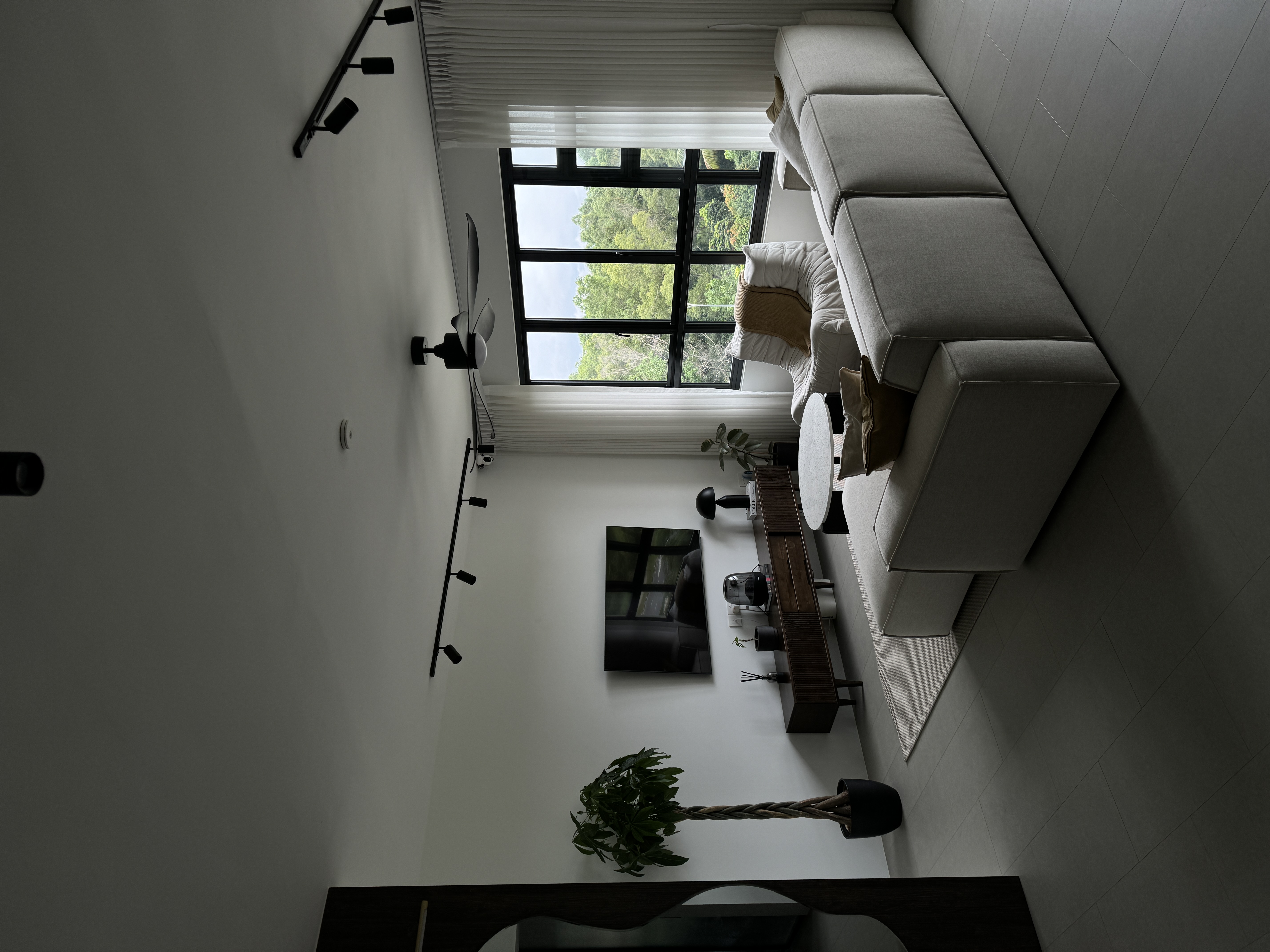 Neutral About Our Living Room - Modern minimalist living room, sleek furniture, large window, natural light, contemporary
