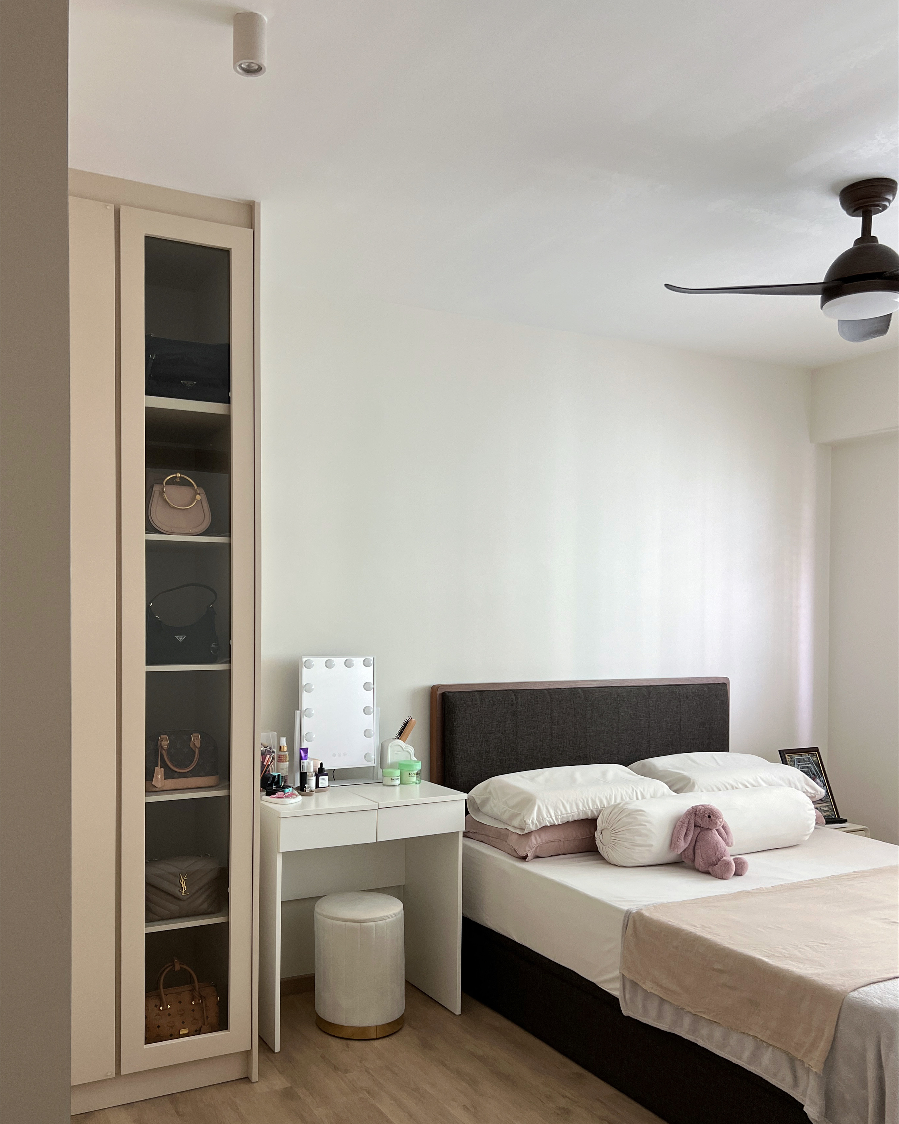 All Neutral - Simple & functional MBR  - Light fixture, beige wardrobe, glass shelves, black handbag, beige handbag, white