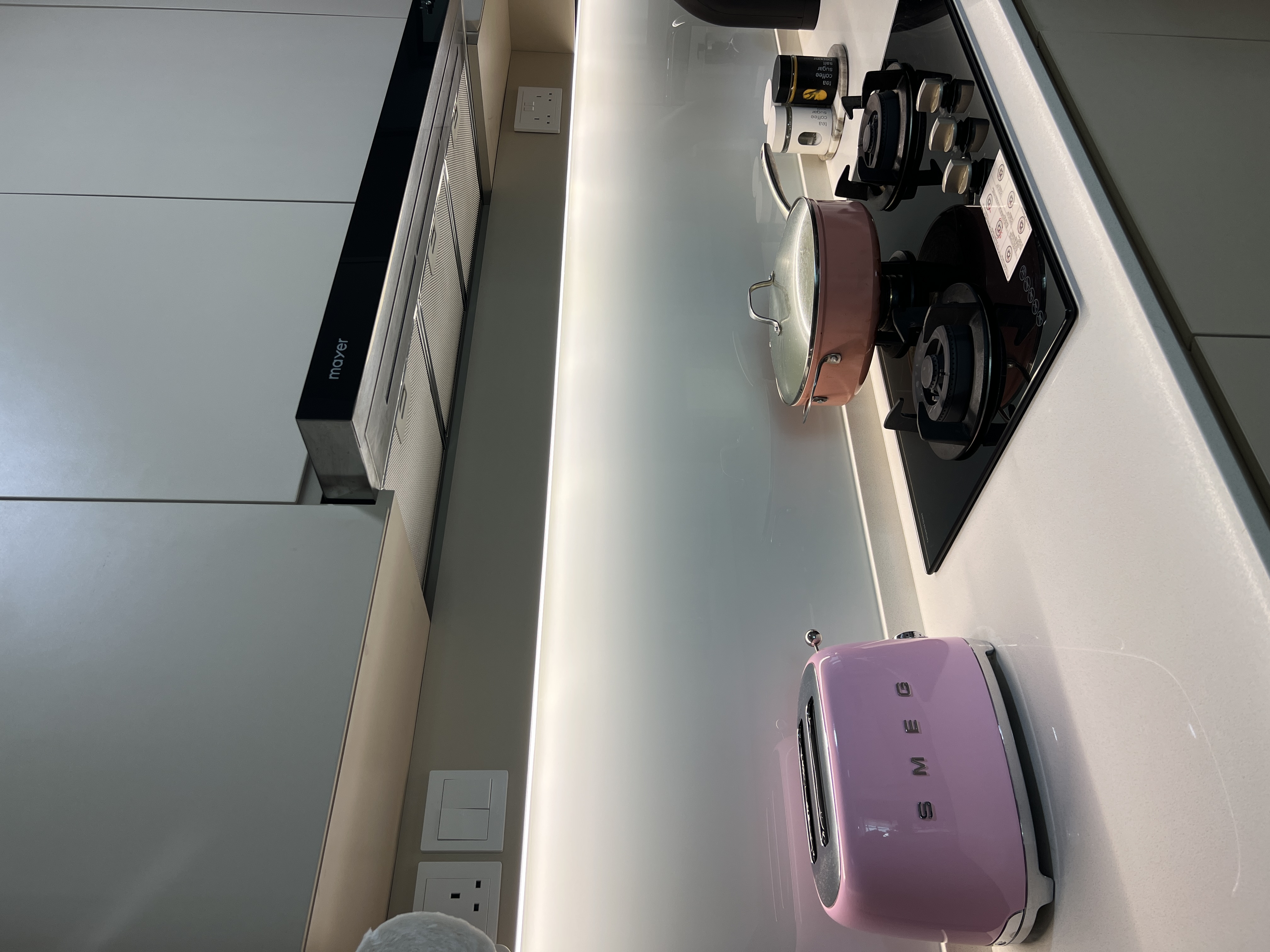 A neutral-minimalist-functional Kitchen - Modern kitchen countertop, sleek appliances, minimalist design, contemporary