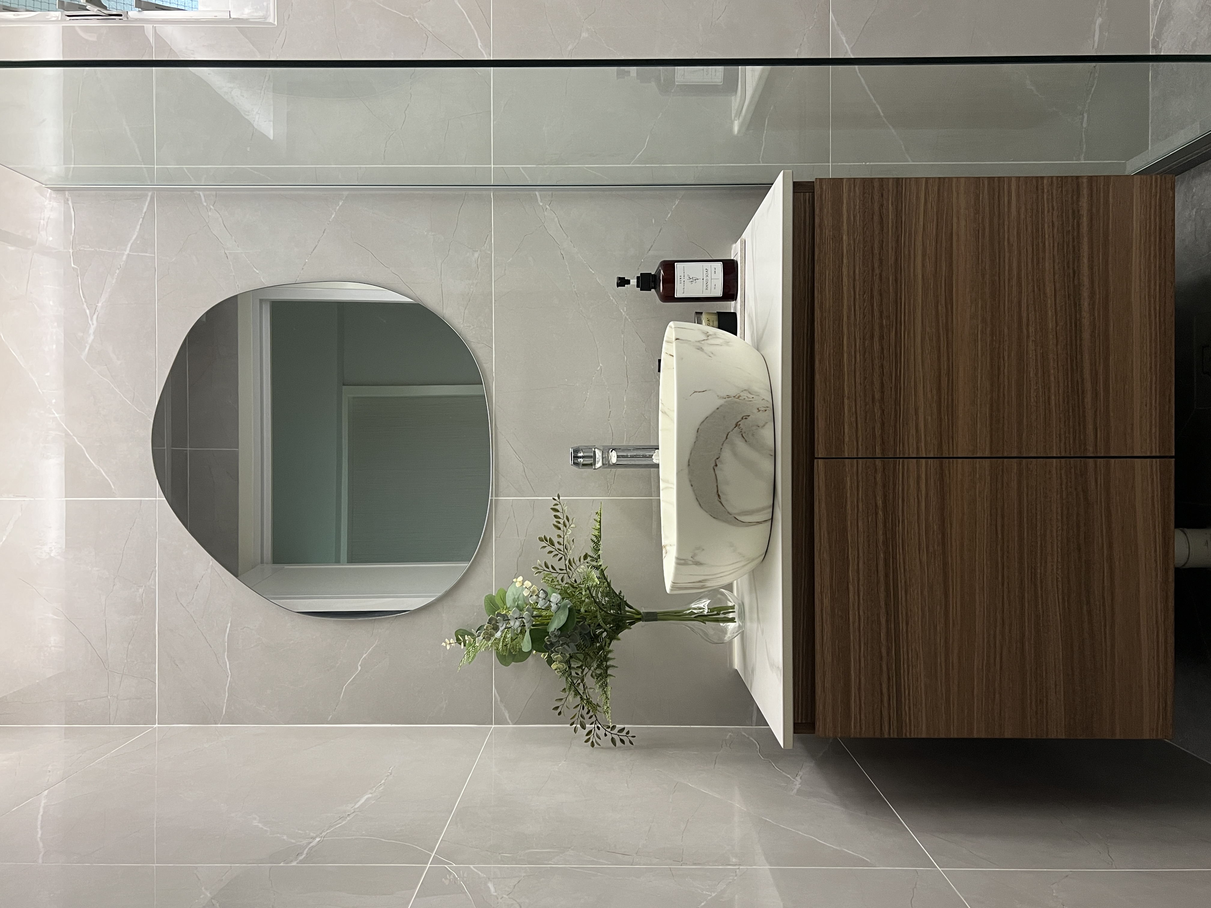 Lux Style Guest's Bathroom - Silver & Grey Theme - Modern bathroom, minimalist design, sleek fixtures, round mirror, marble