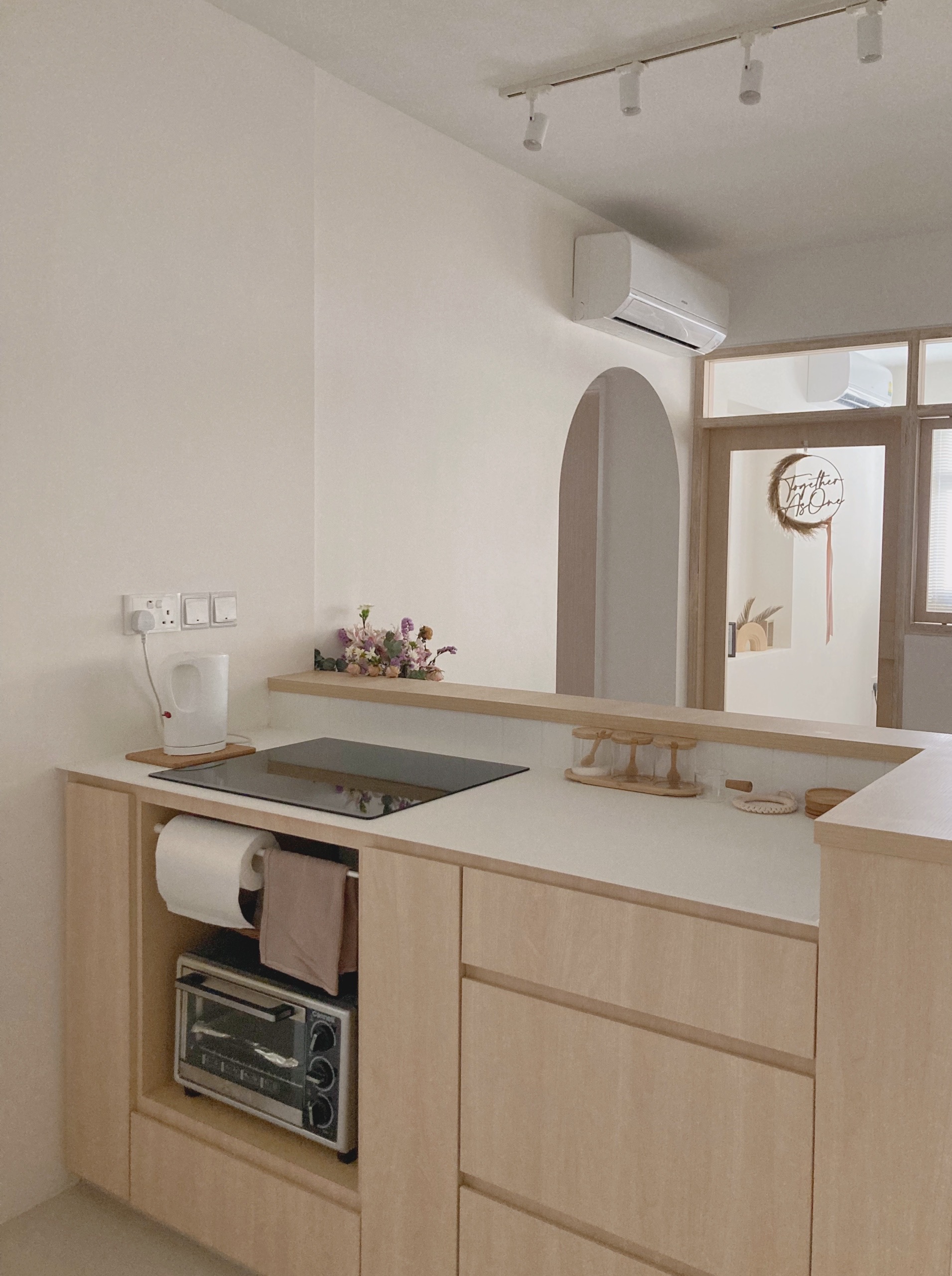 Simple but unconventional open concept kitchen  - Wooden kitchen cabinetry, modern design, minimalist style, light beige