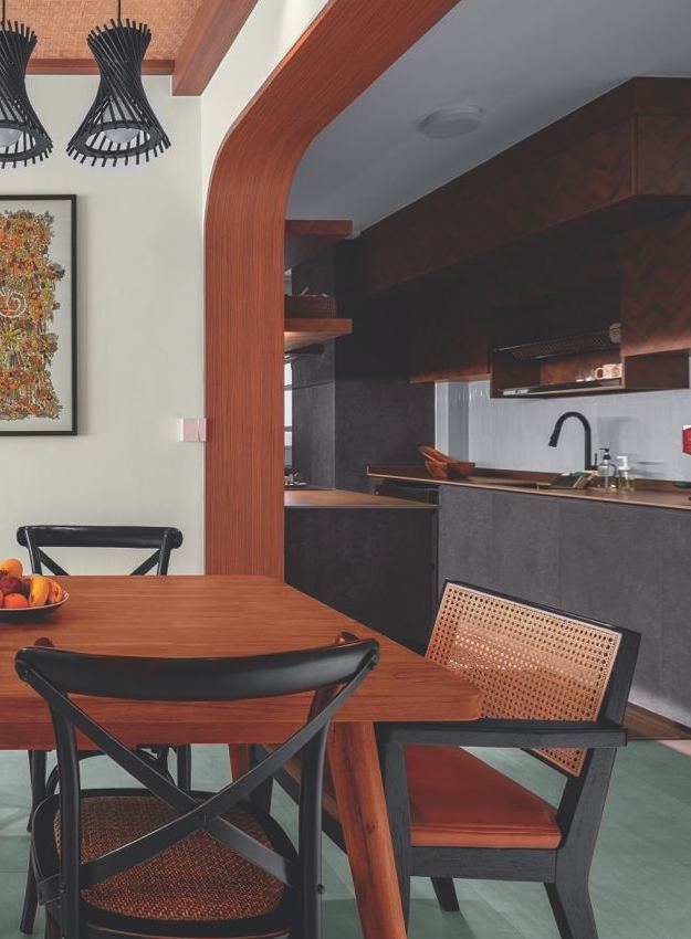 Dining Area Tour: Perfect for Hosting! - Wooden dining table, black metal chairs, fruit bowl on table, modern kitchen design