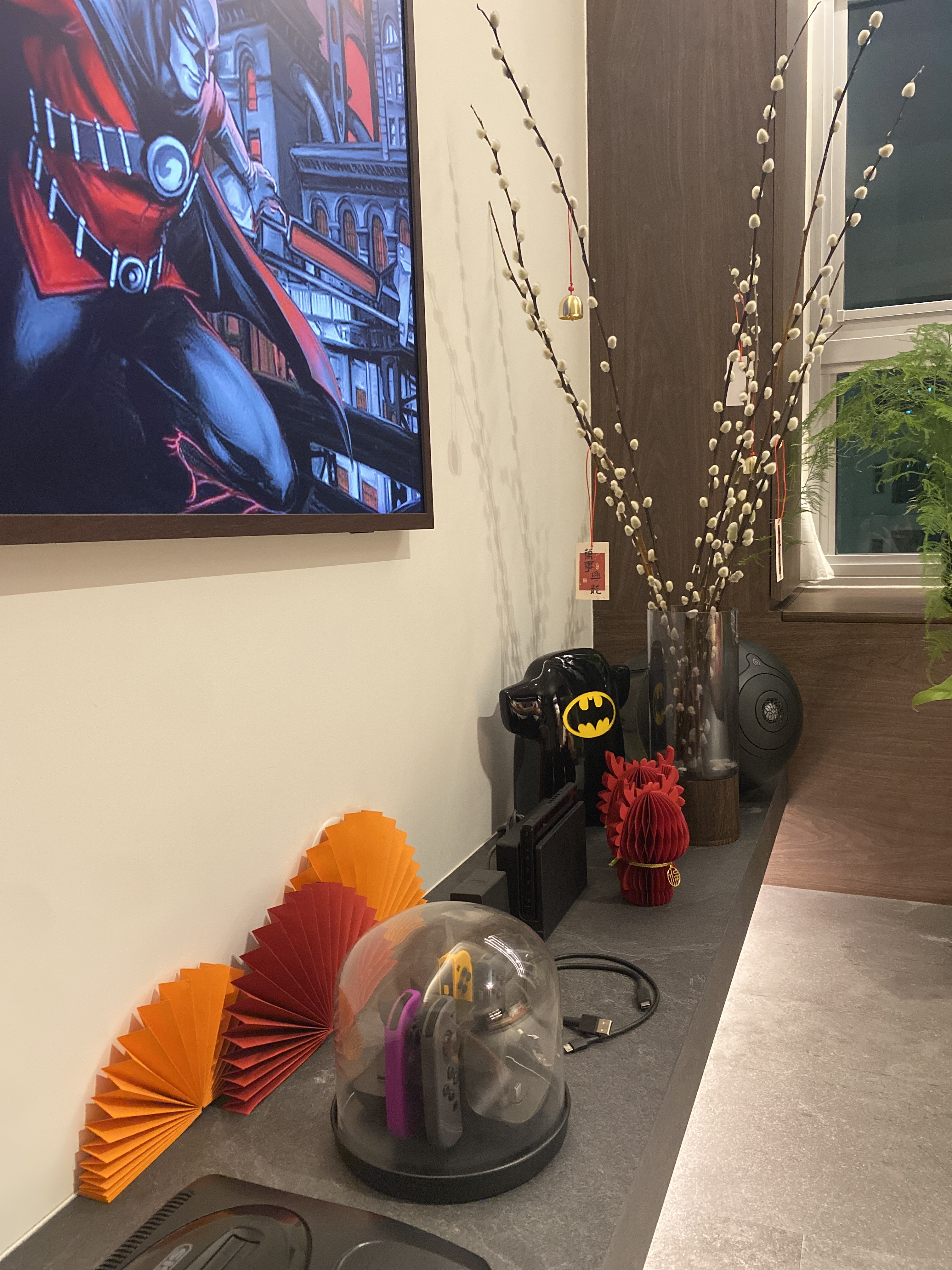Trying not to lose the CNY essence with our contemporary CNY deco - batman-themed decor, Batman artwork, red and black color