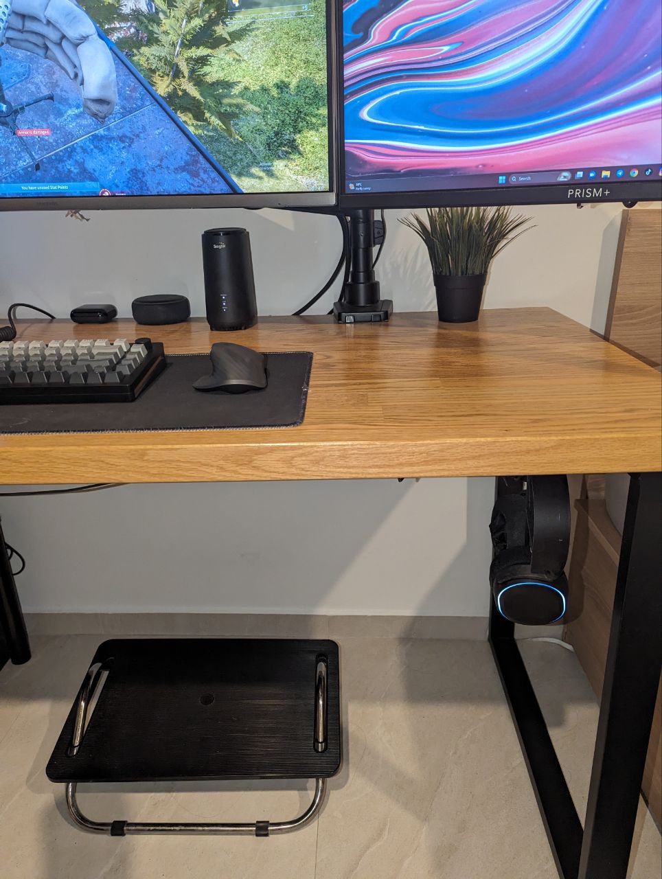 WFH and PFH (play from home) seamlessly - Dual-monitor setup, ergonomic desk, black keyboard and mouse, modern workspace