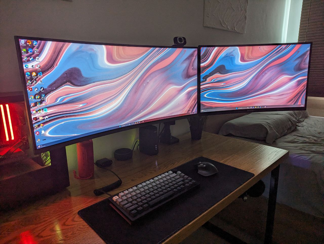 WFH and PFH (play from home) seamlessly - Dual-monitor setup, vibrant wallpaper, dual desktop screens, computer peripherals