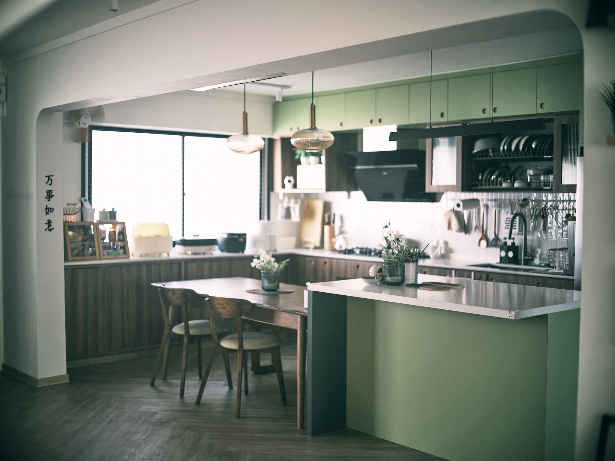 A vintage kitchen's efficient design for modern cooking - Modern kitchen with wooden dining table and chairs, minimalist