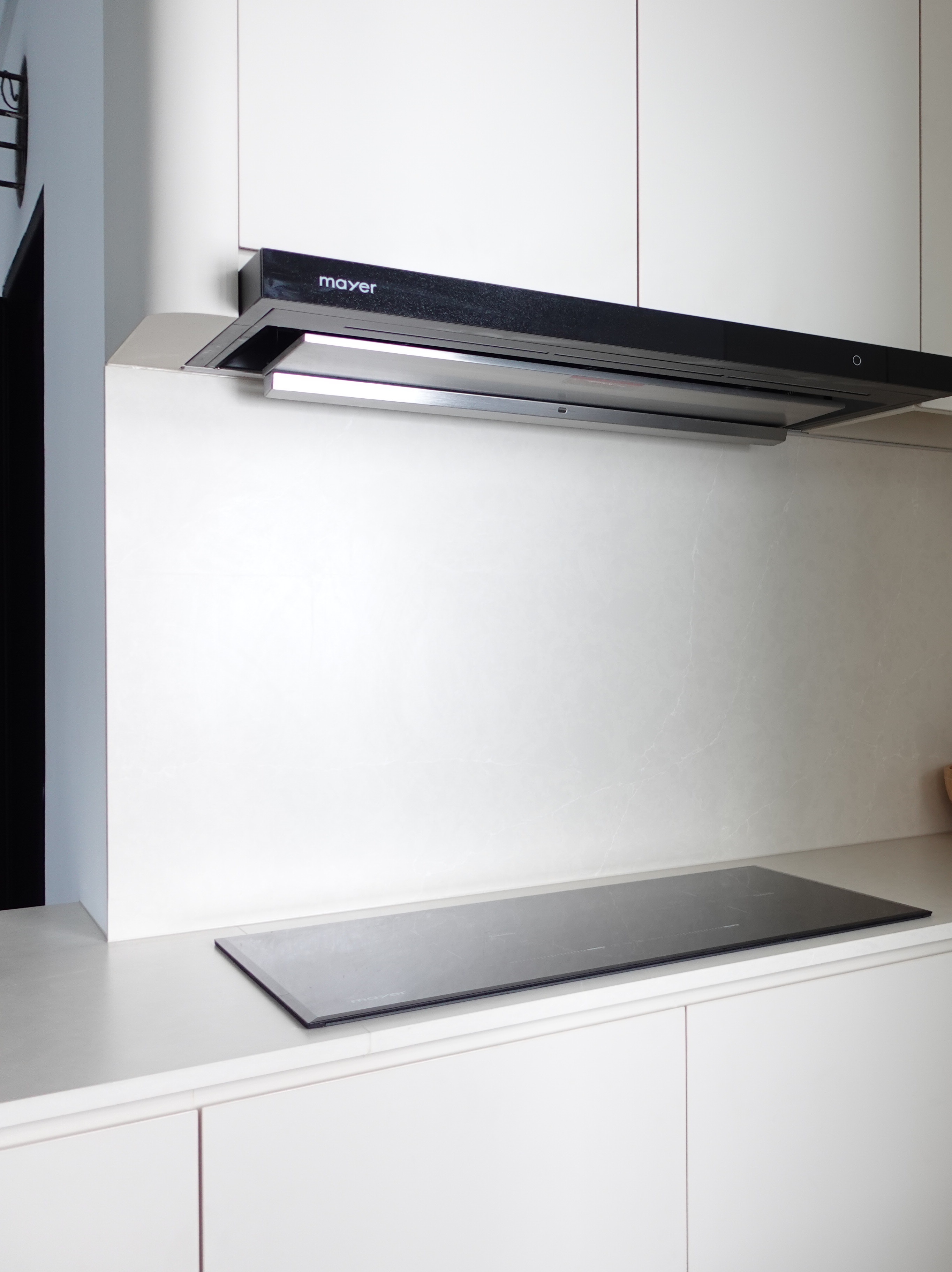 How we hid everything for a minimal kitchen - Mayer range hood, sleek kitchen design, modern appliances, minimalist decor