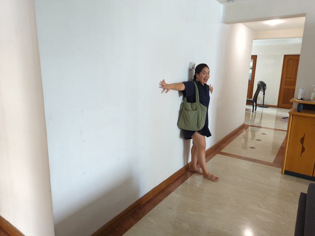 Spacious eclectic kitchen with large countertop!  - White wall, minimalist interior, woman standing, green bag, barefoot
