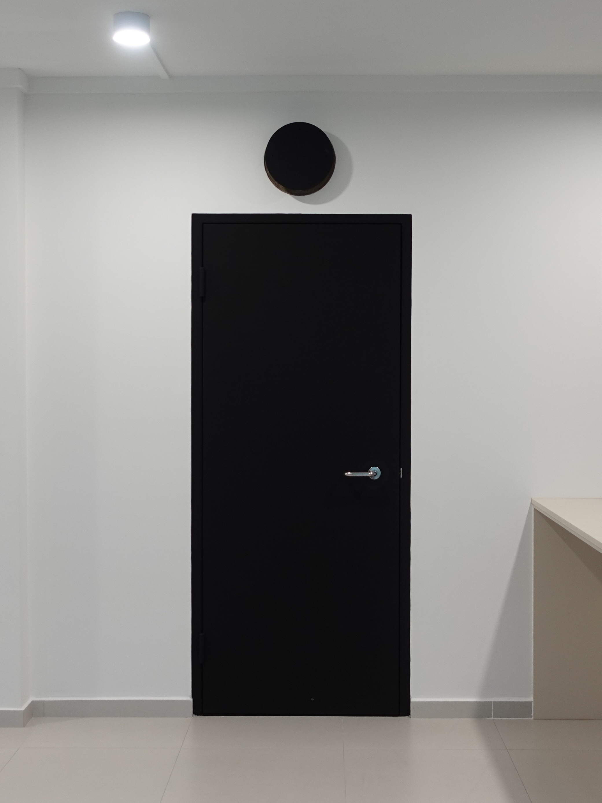 A minimal living room with a full out DIY TV console - Modern minimalist interior, sleek black door, minimalist design