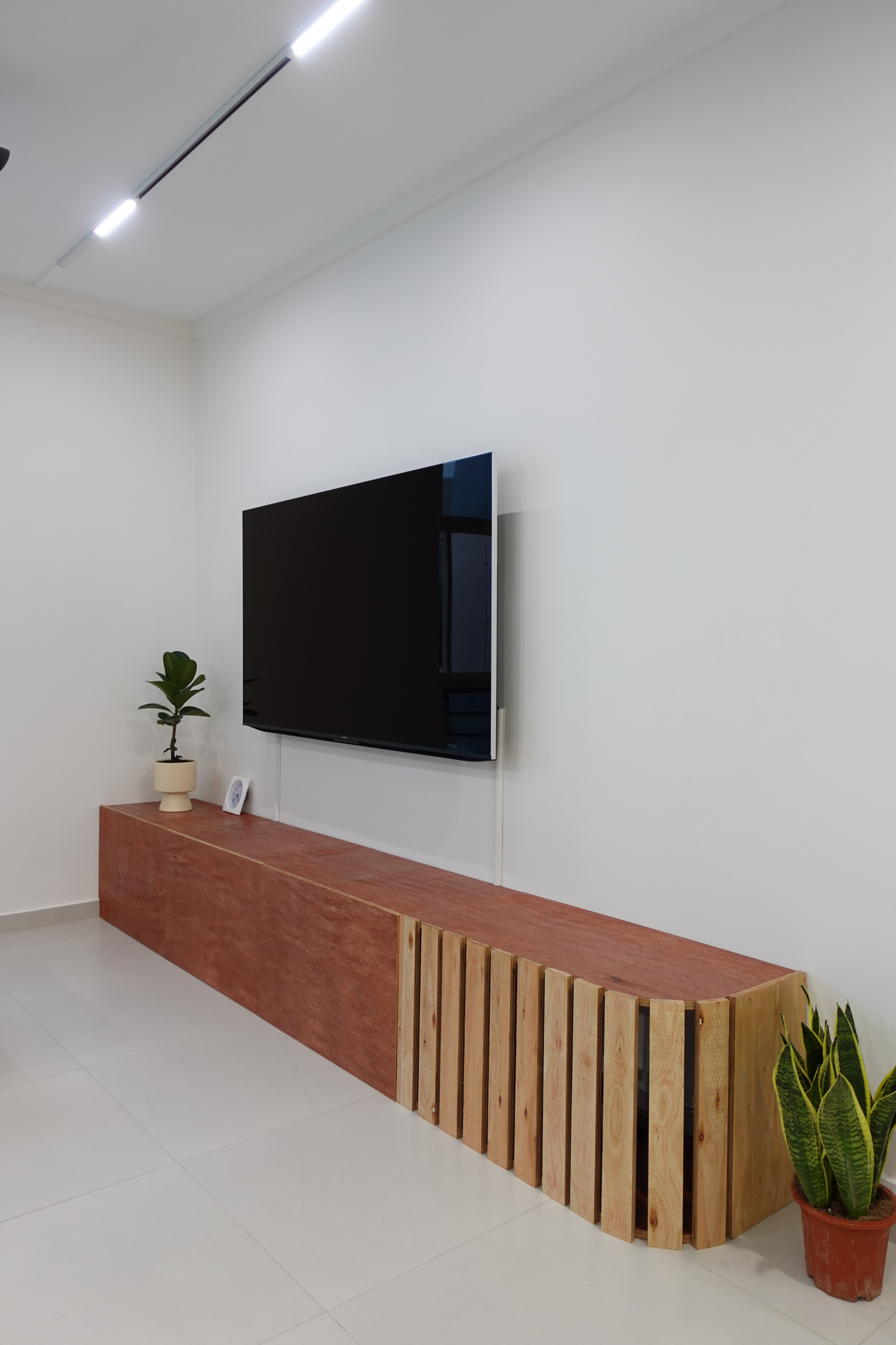 A minimal living room with a full out DIY TV console - Modern minimalist living room, sleek wooden TV stand, contemporary
