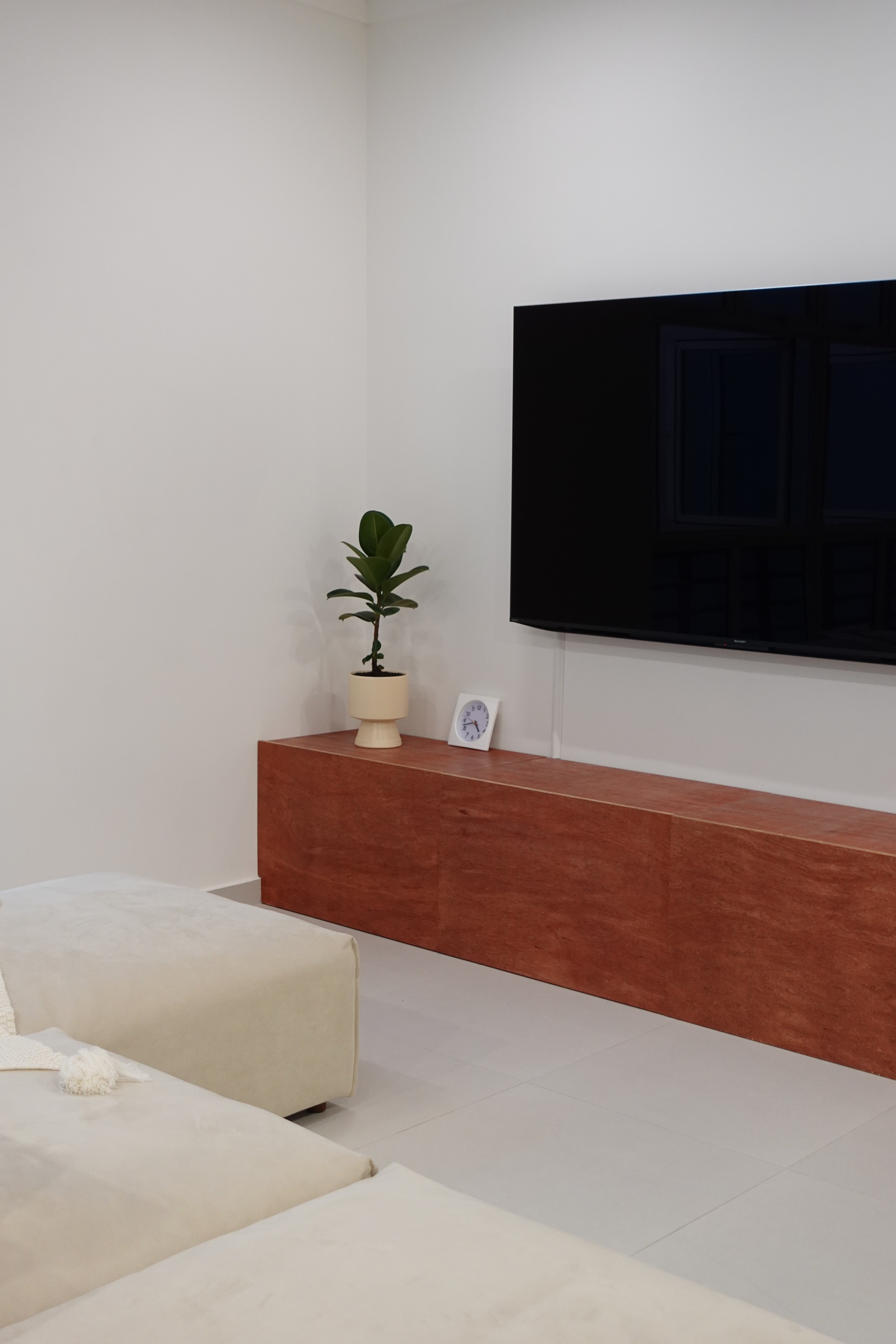 A minimal living room with a full out DIY TV console - Minimalist living room, modern decor, sleek furniture, large
