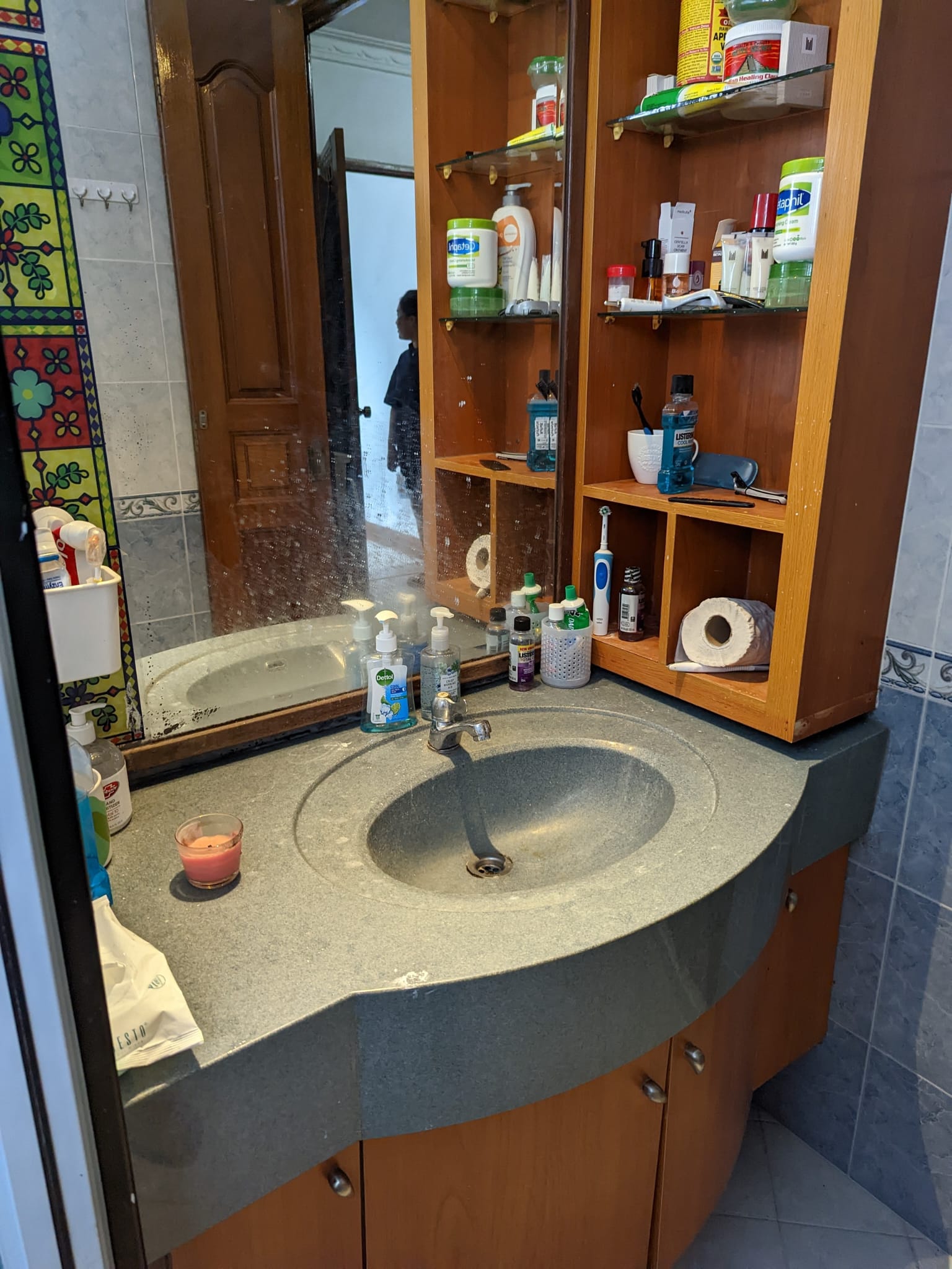 Wired glass - privacy with a fun touch for our toilets - Bathroom sink, granite countertop, wooden cabinet, mirror