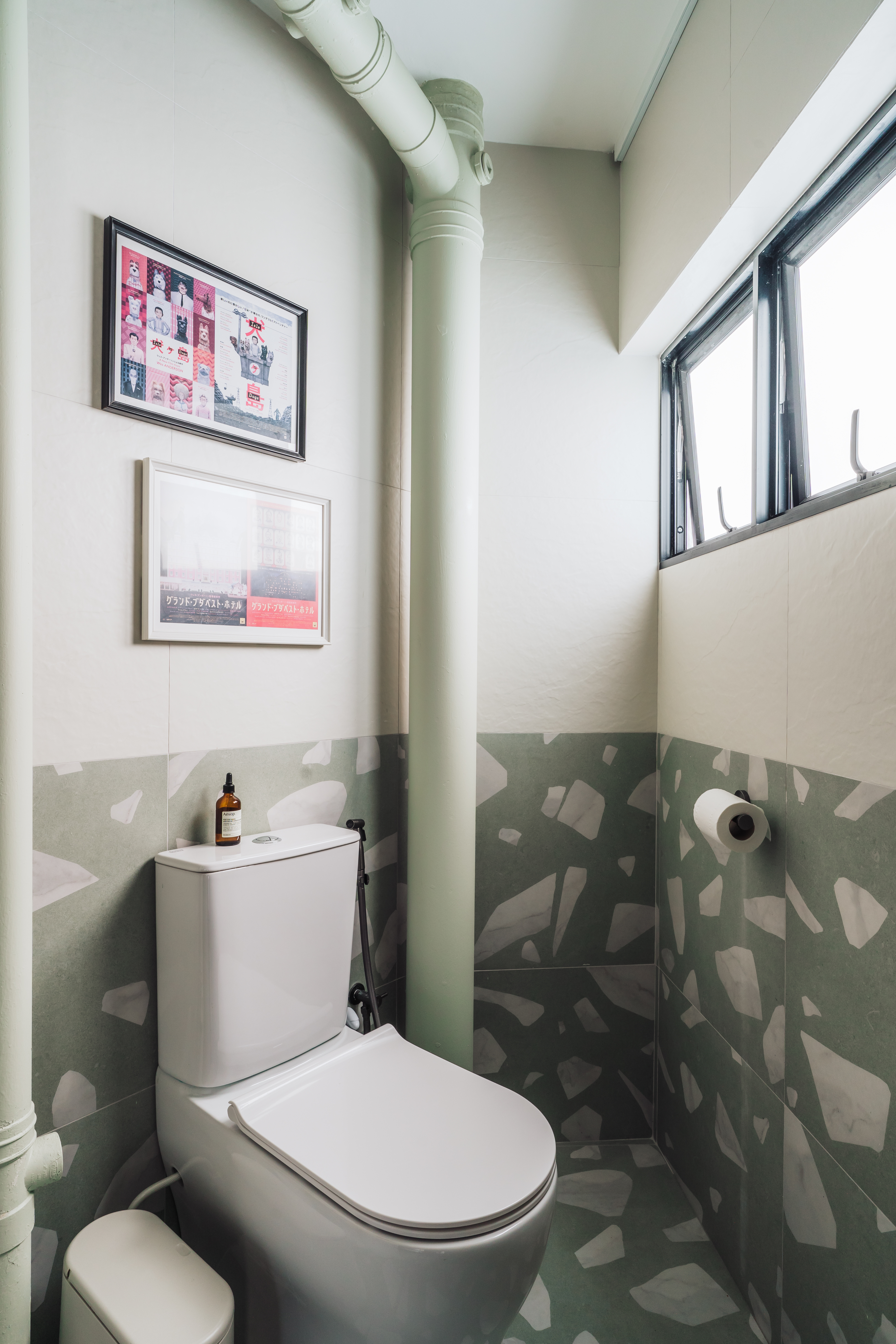 Wired glass - privacy with a fun touch for our toilets - Modern bathroom with green and white tiles, white toilet, framed