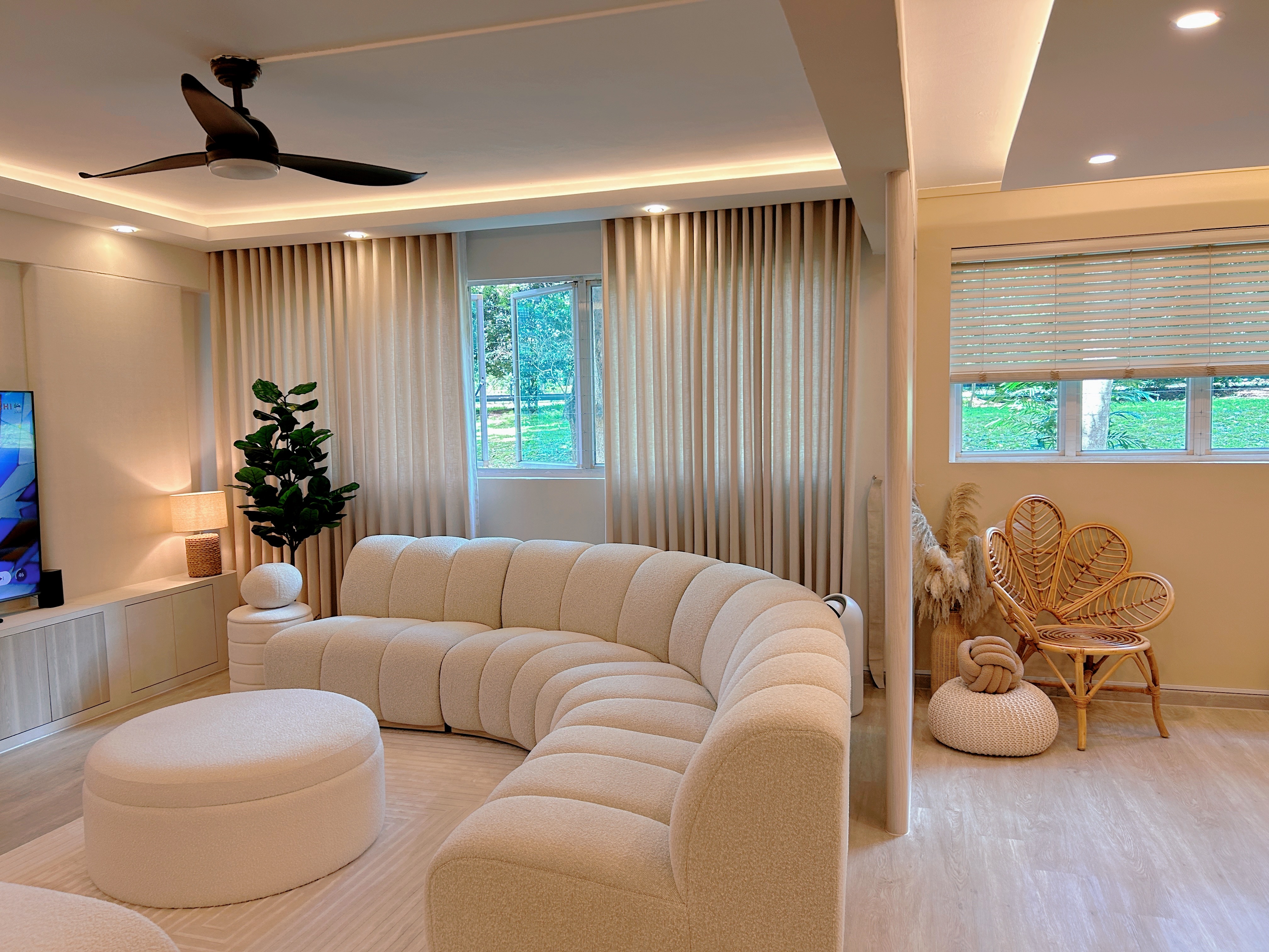 Entryway/ Balcony Transformation! - Modern living room with beige sofa, floor lamp, and potted plant. Large window with