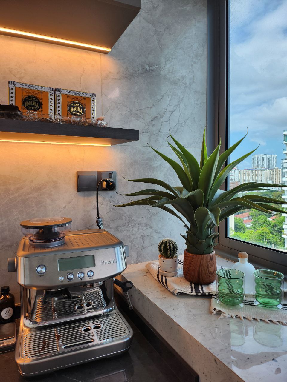Green Babies: real or faux? - Modern kitchen, coffee machine, espresso machine, Breville brand, marble wall, shelf with