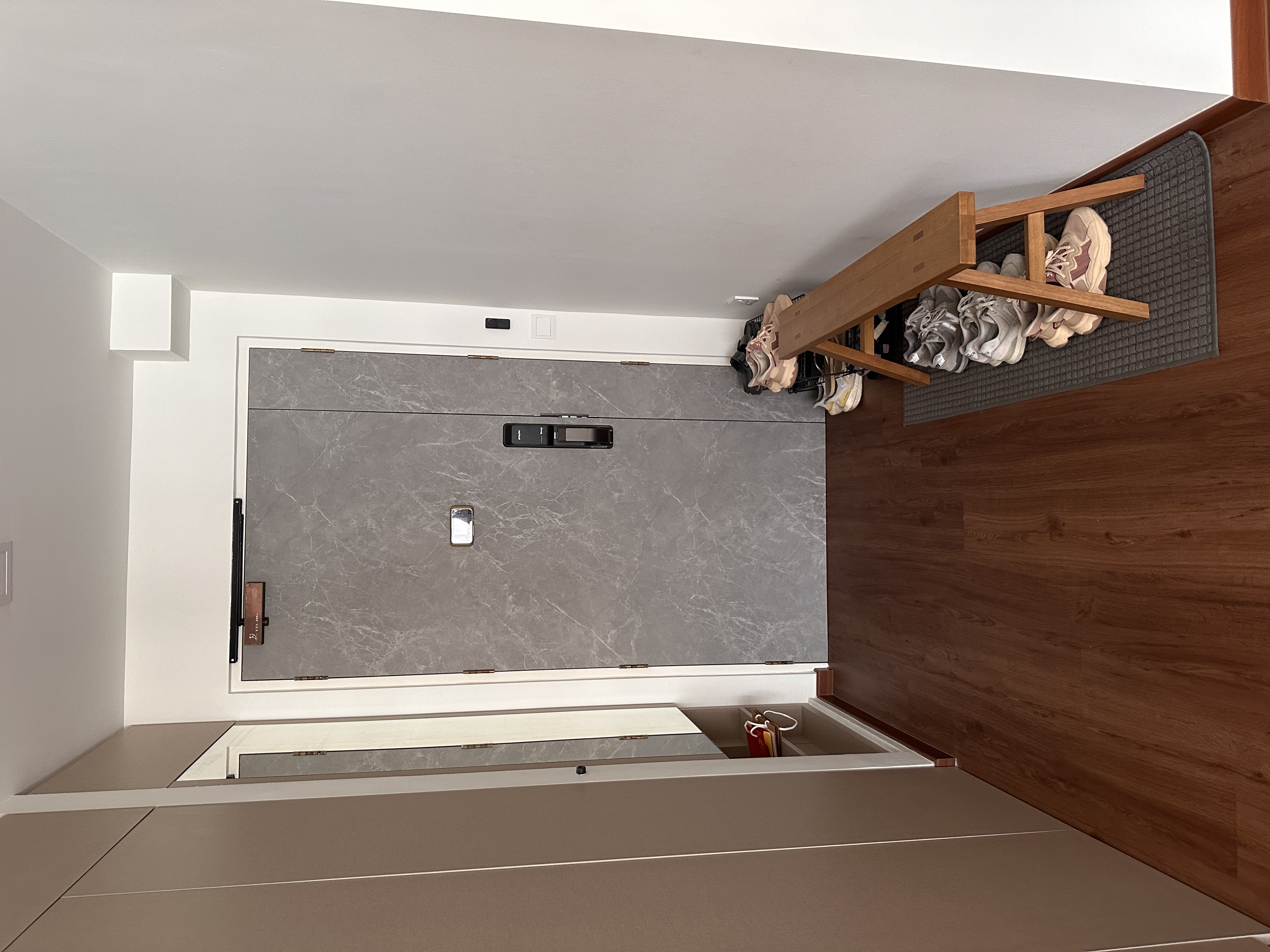 Minimalist yet functional home under $45k - Grey marble wall, wooden floor, modern design, minimalist decor, open storage