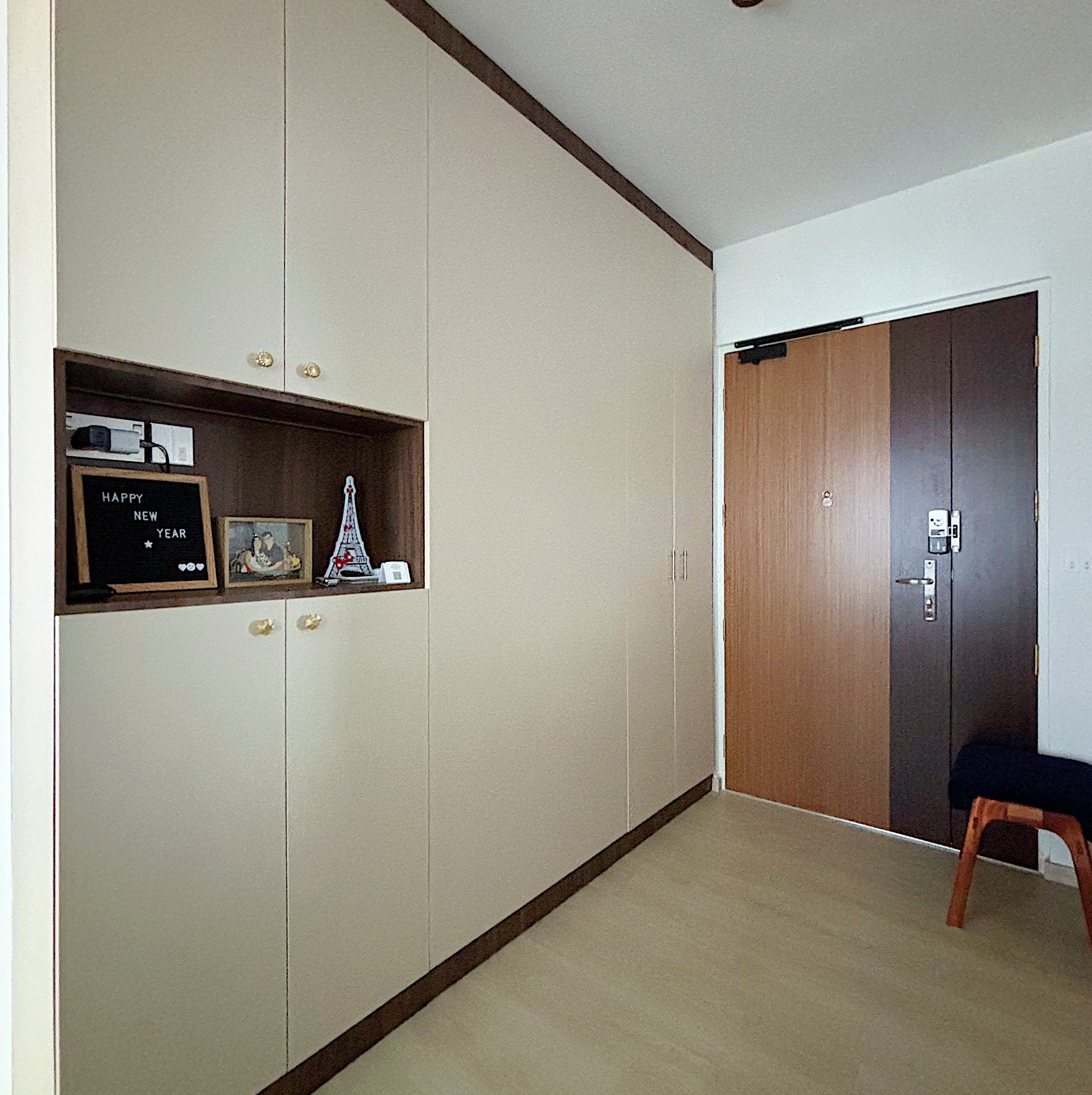 Entryway that welcomes you into our home - Cabinets, wooden doors, light beige walls, minimalist design, small chalkboard