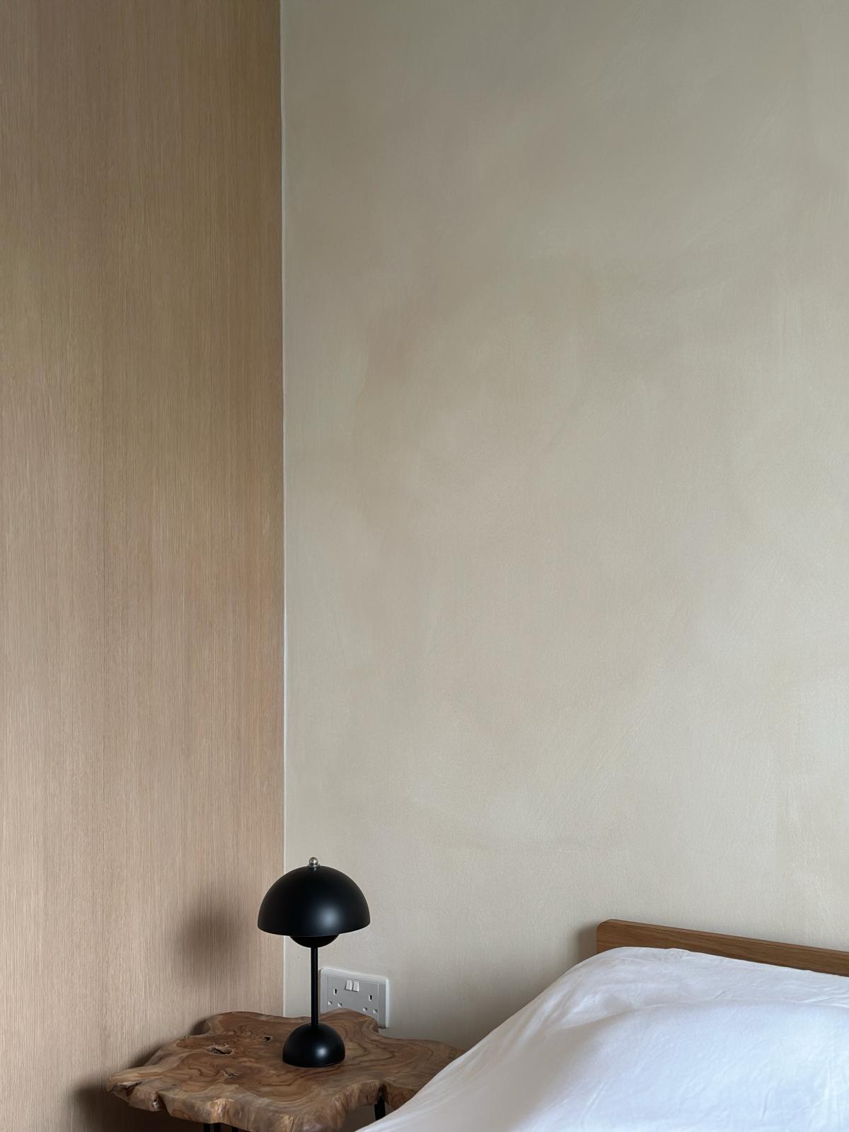 Japandi and wabi-sabi master bedroom  - Wooden wall, minimalist design, modern decor, cozy room, bedside table, black lamp