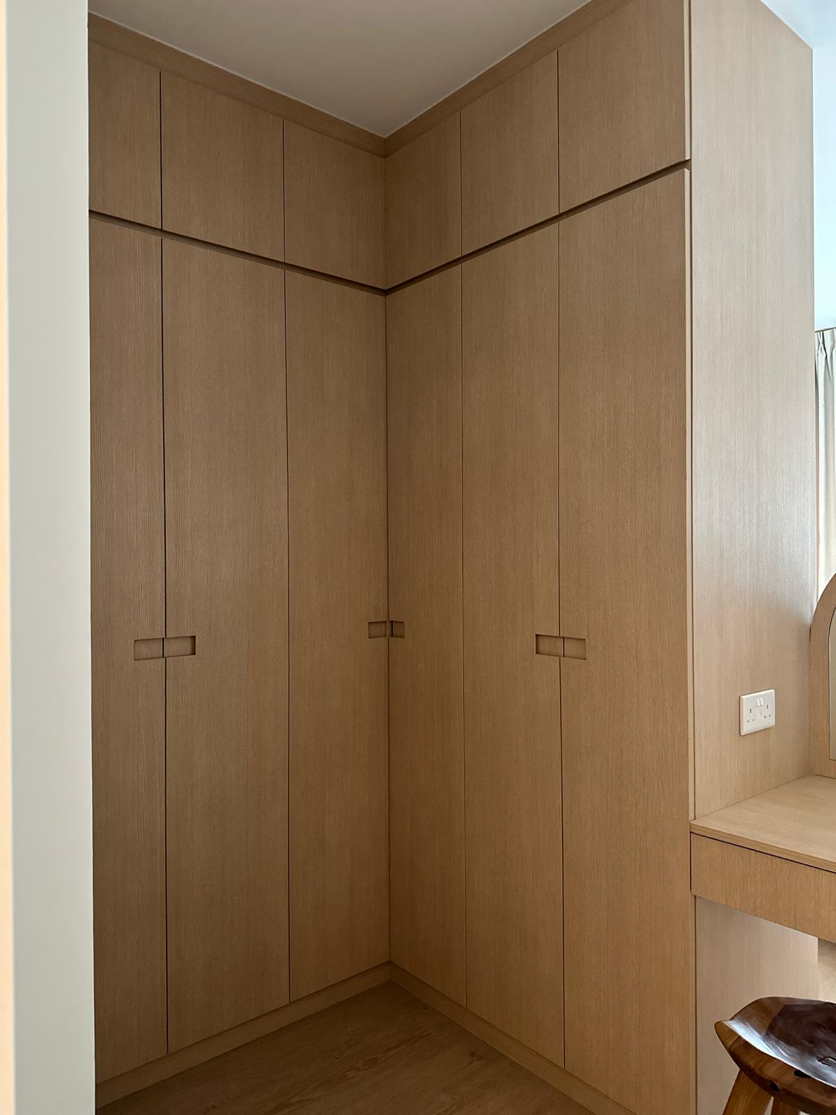 Our mini walk-in wardrobe in master bedroom  - Wooden wardrobe with integrated shelving, minimalist design, light brown