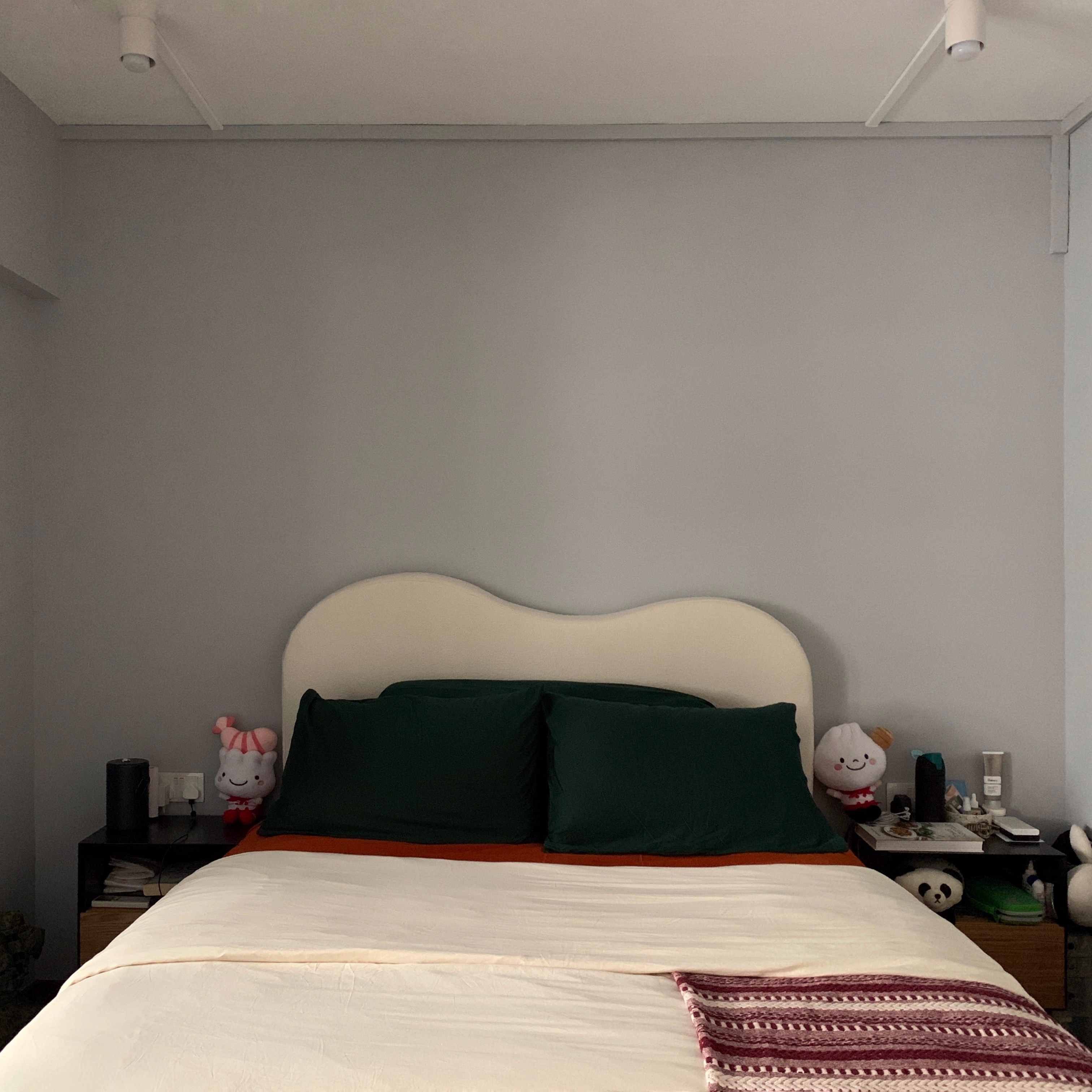 Bits and Pieces - Snippets of Our Fav Home Decor - White upholstered headboard, dark green pillows, maroon and white blanket