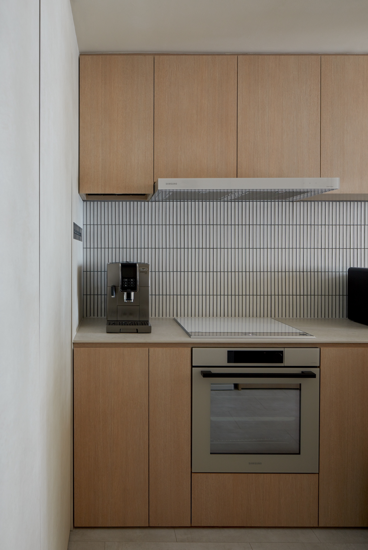 A 689sqft 2-Bedder Japandi Resale in North-east - Wooden kitchen cabinets, modern appliances, stainless steel coffee machine