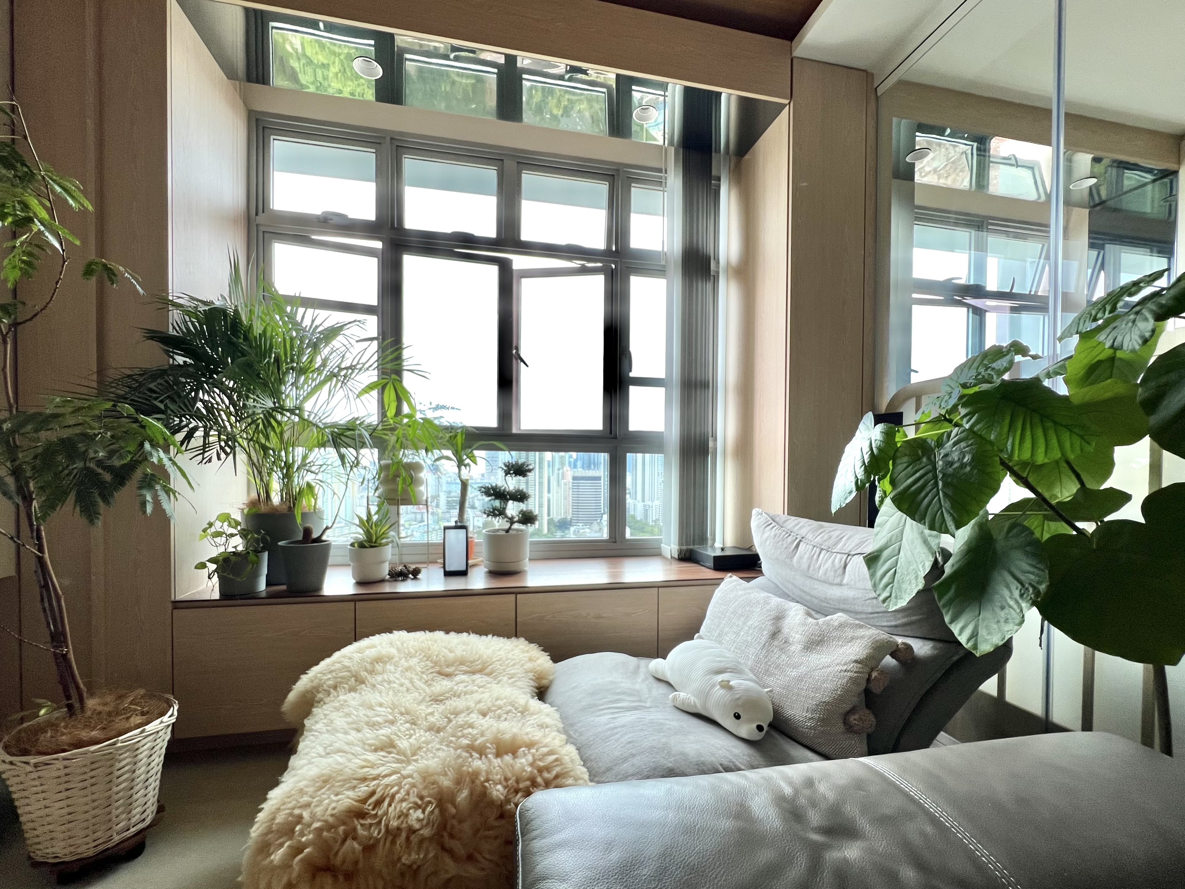 Wooden Element with Japanese Inspired Interior - Large windows, indoor plants, cozy living room, modern decor, natural light