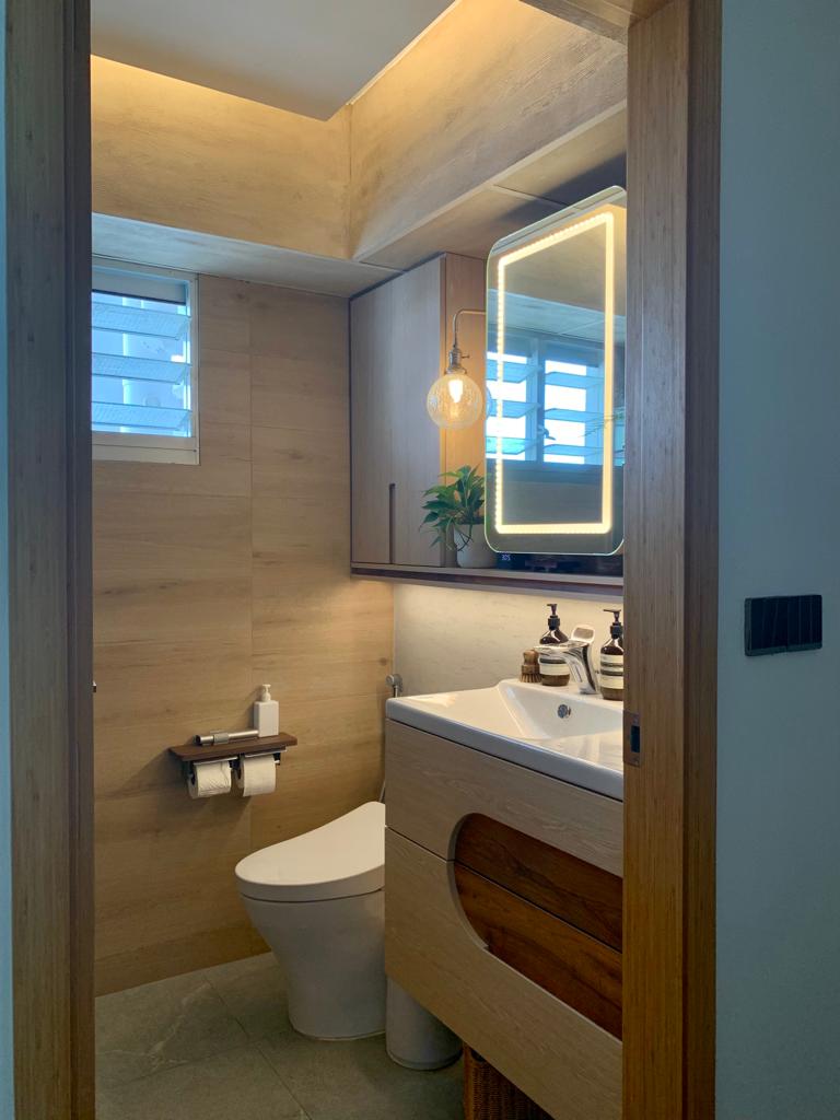 Wooden Element with Japanese Inspired Interior - Wooden cabinetry, modern design, sleek sink, white porcelain, toilet, wooden