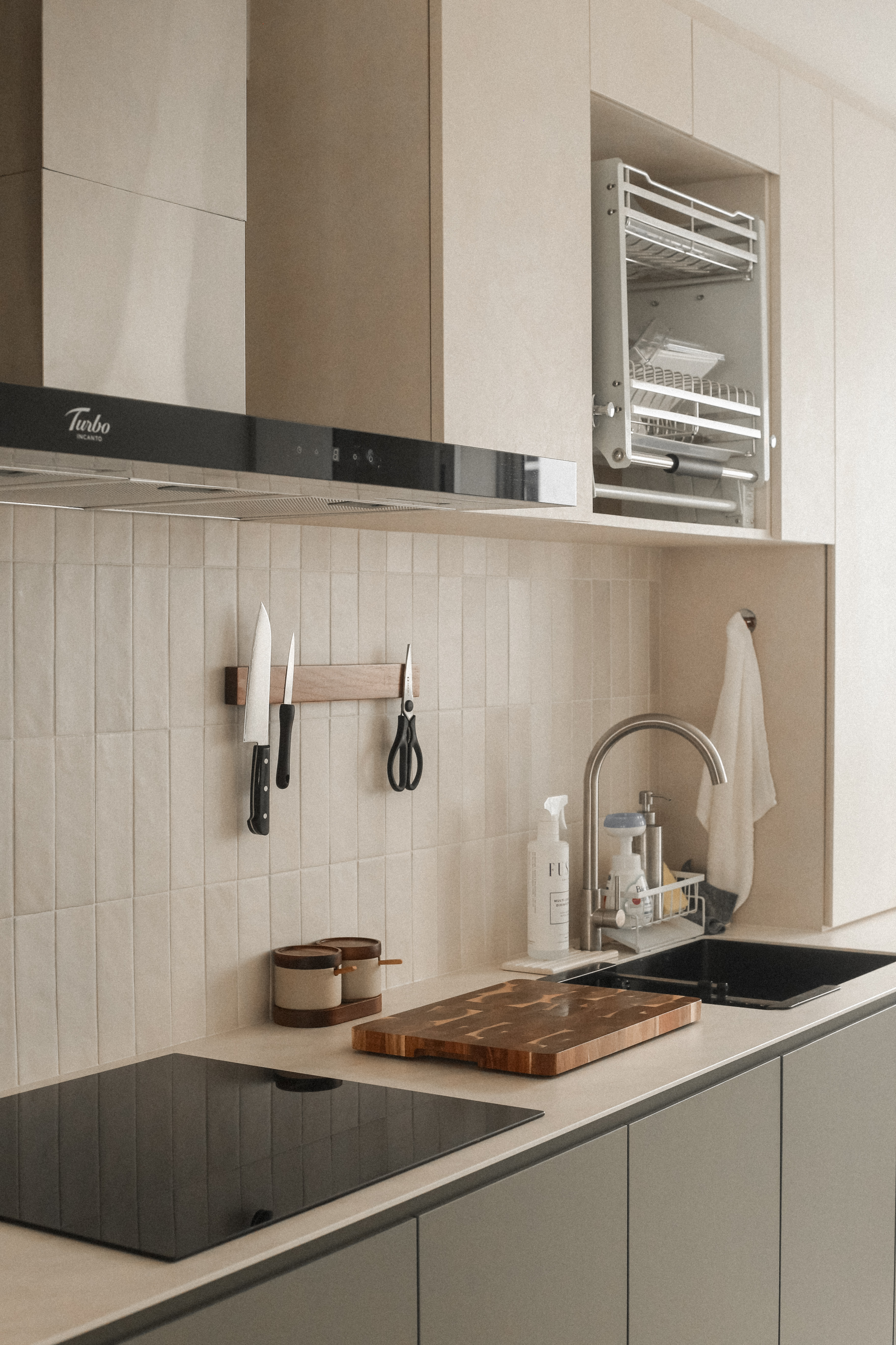 Welcome to our Littleroot House! - Kitchen countertop, modern kitchen, stainless steel range hood, beige tiles, wooden
