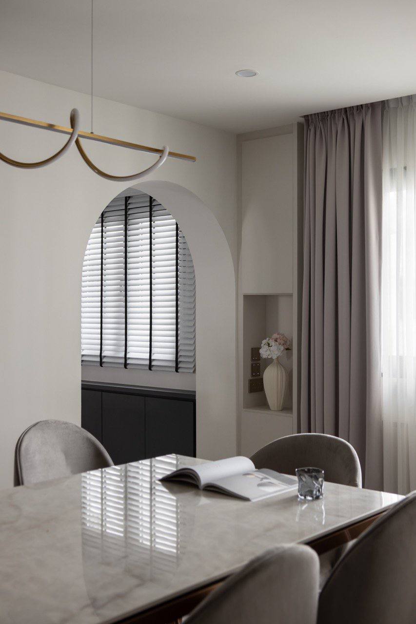 Modern x Contemporary Open-Concept Home Unveiled! - Modern dining room with marble table, elegant chandeliers, soft natural