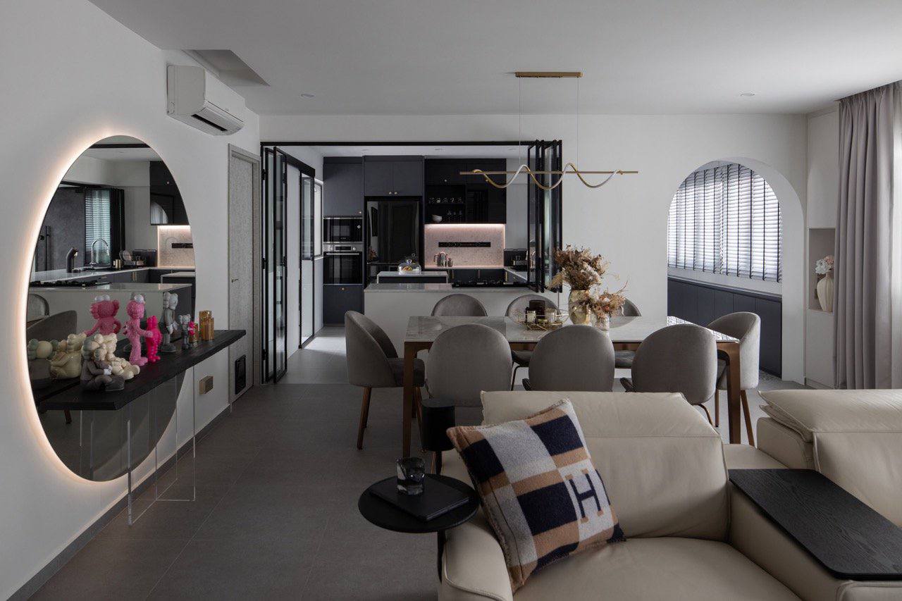 Modern x Contemporary Open-Concept Home Unveiled! - Modern minimalist kitchen with sleek black cabinetry, contemporary dining