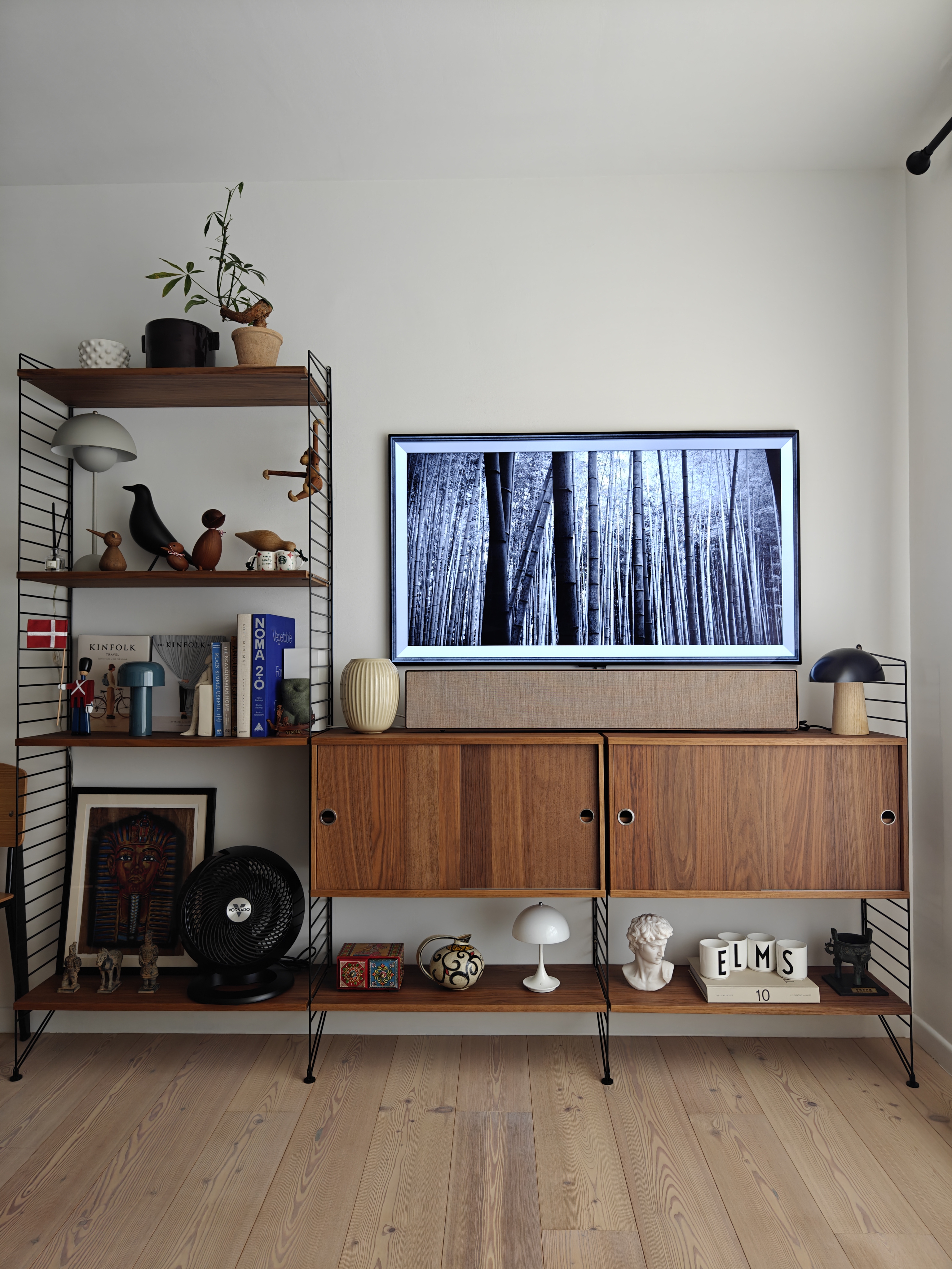 A 3-Gen Scandinavian Home - Wooden shelf, black lamp, black bird figurine, wooden bird figurine, black