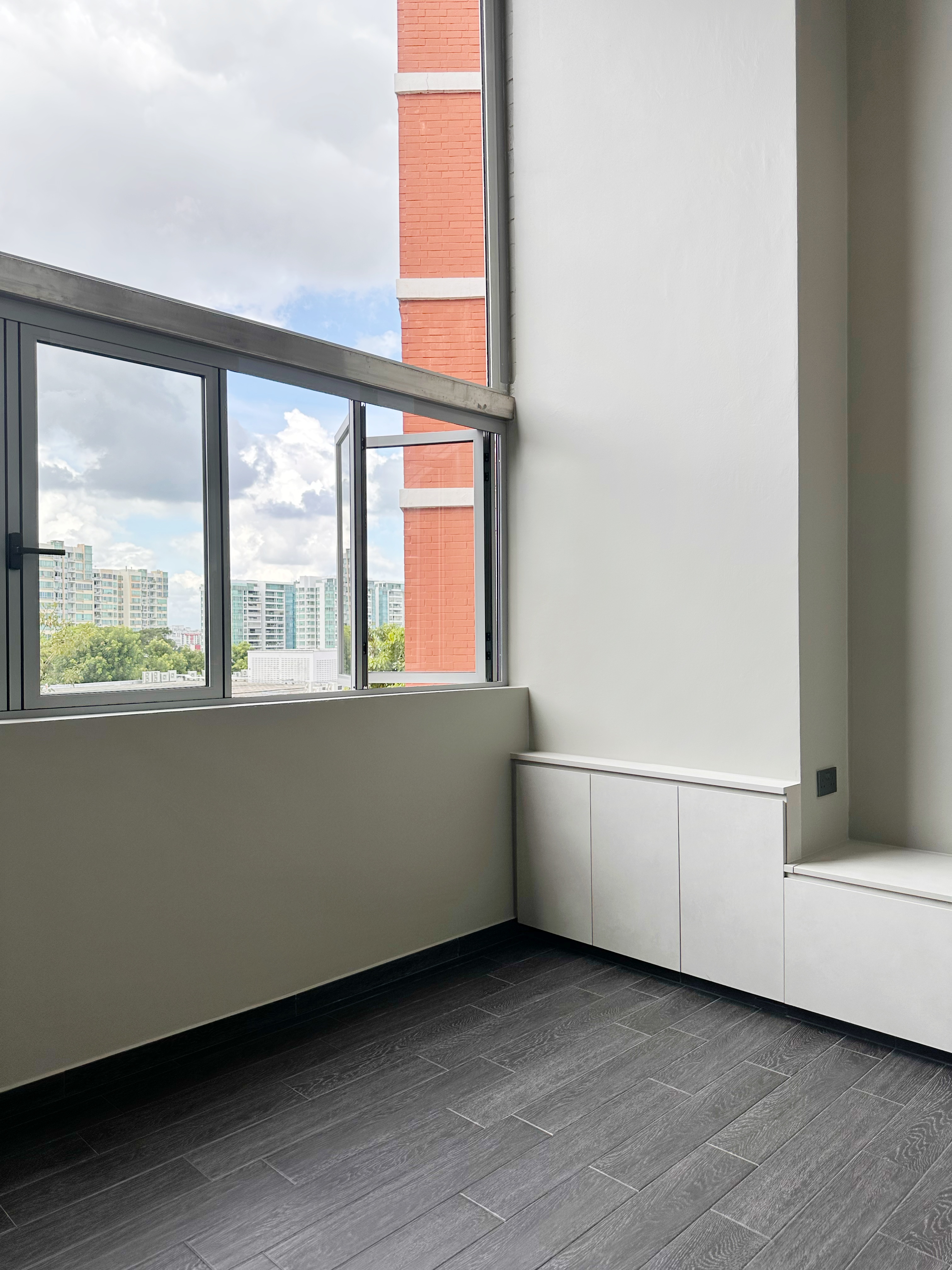 When Industrial meets Wabi-Sabi details within 1593sqft. - Modern minimalist apartment, large window, urban cityscape, blue