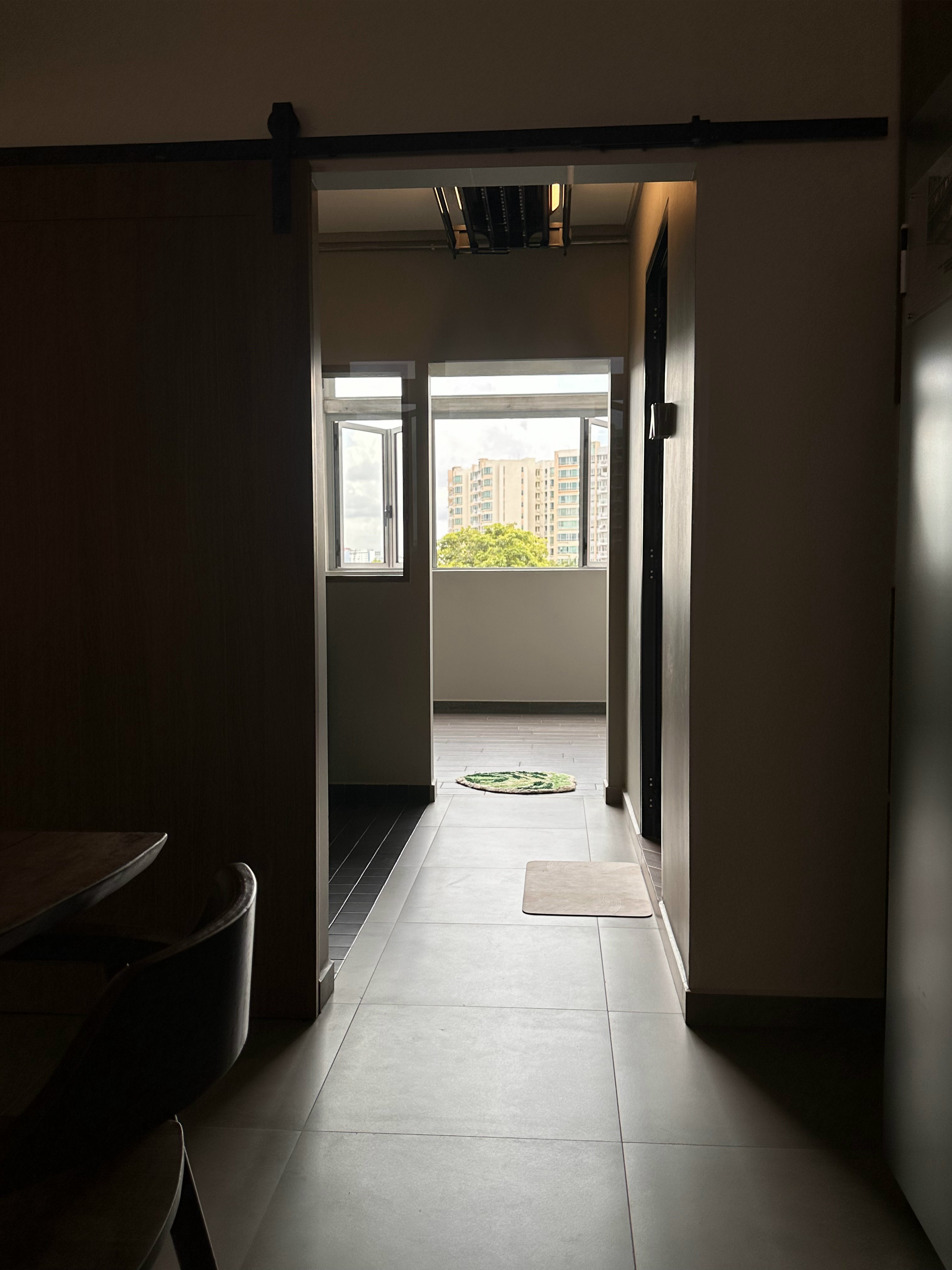 When Industrial meets Wabi-Sabi details within 1593sqft. - Modern minimalist interior, sleek wooden door, dark wooden table