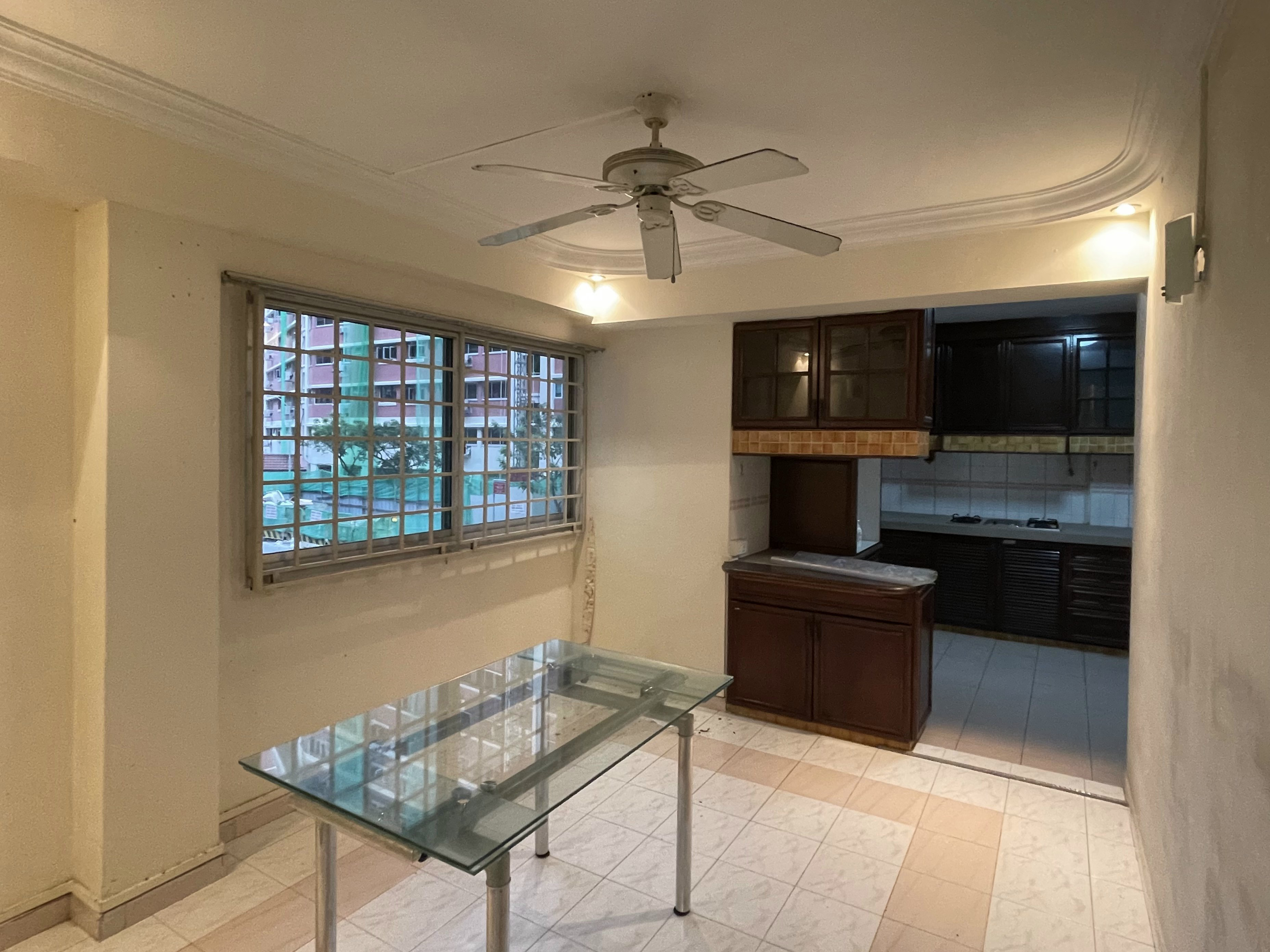 Before & After: Our 5-Room Resale Makeover - Glass dining table, tiled floor, ceiling fan, window, black cabinets, kitchen