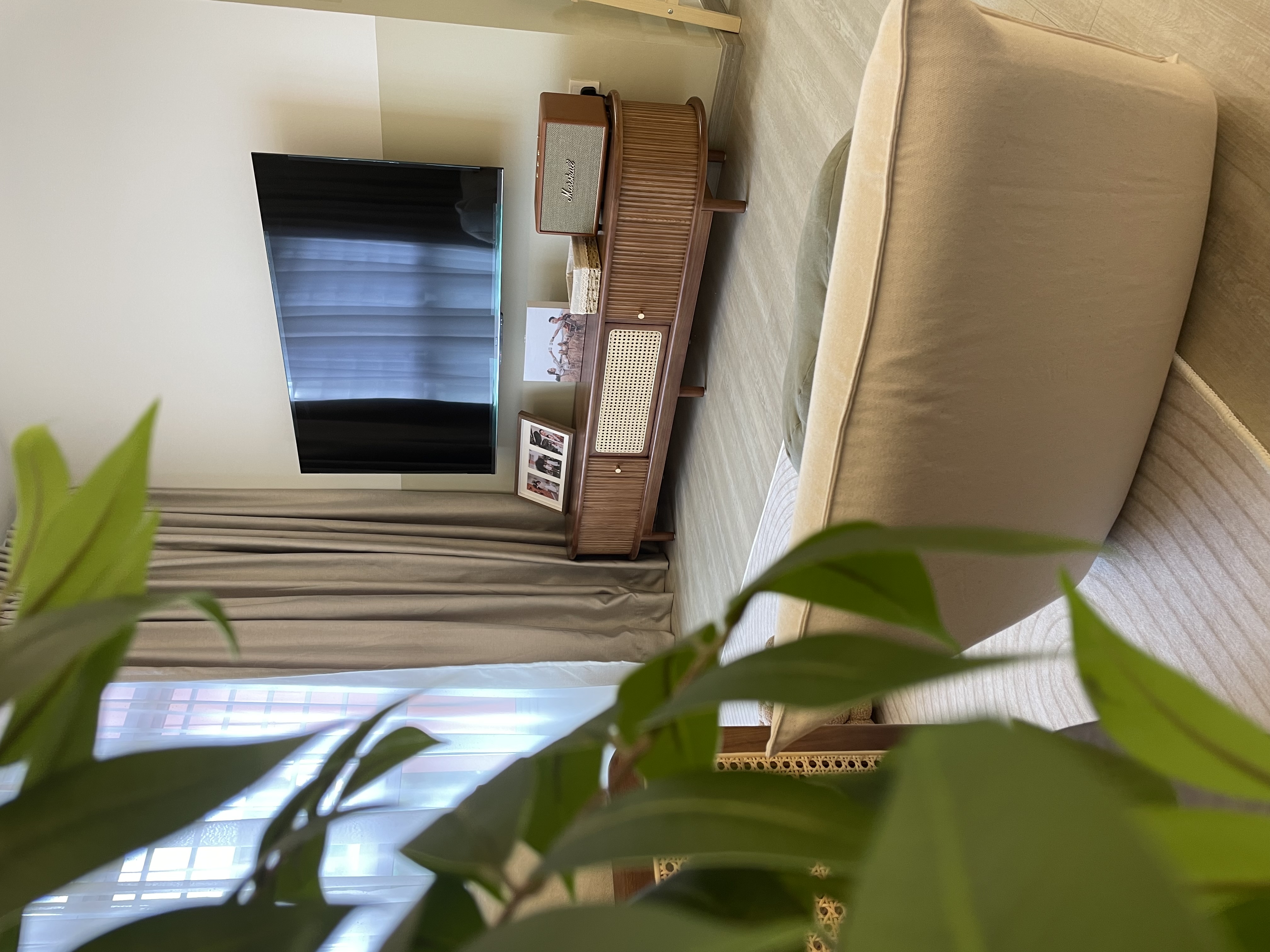 Our cosy crib filled with rattan-wooden accent pieces  - Modern living room, cozy corner, minimalist decor, beige sofa