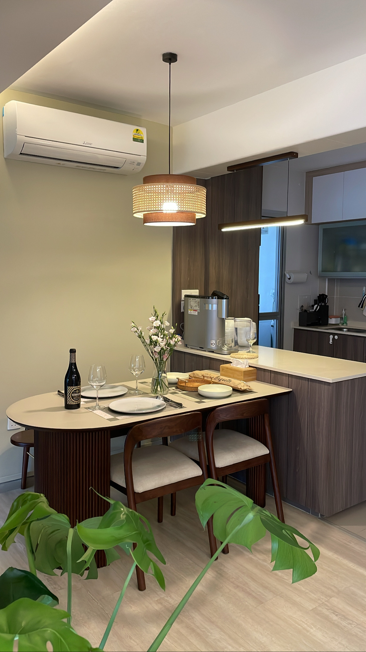 Our cosy crib filled with rattan-wooden accent pieces  - Modern dining room with sleek design, wooden dining table, elegant