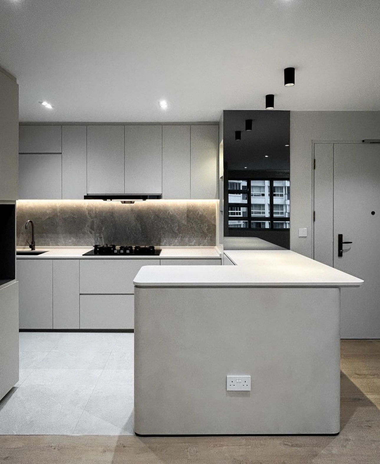 Unveiling The Littlestarry Loft - modern kitchen, minimalist design, sleek cabinetry, gray color scheme, stainless steel