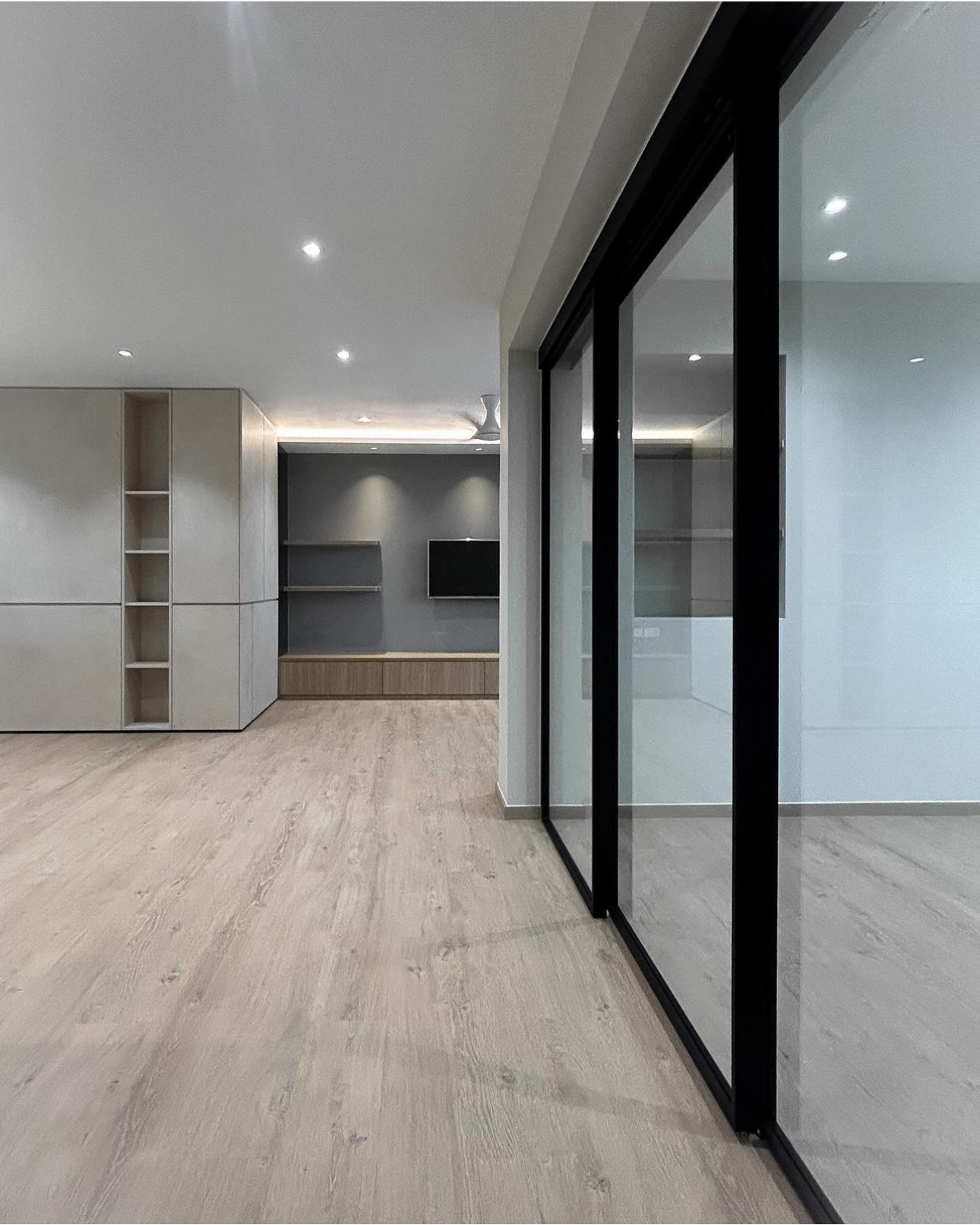 Unveiling The Littlestarry Loft - Modern minimalist interior, sleek cabinetry, open shelving, contemporary design, light wood