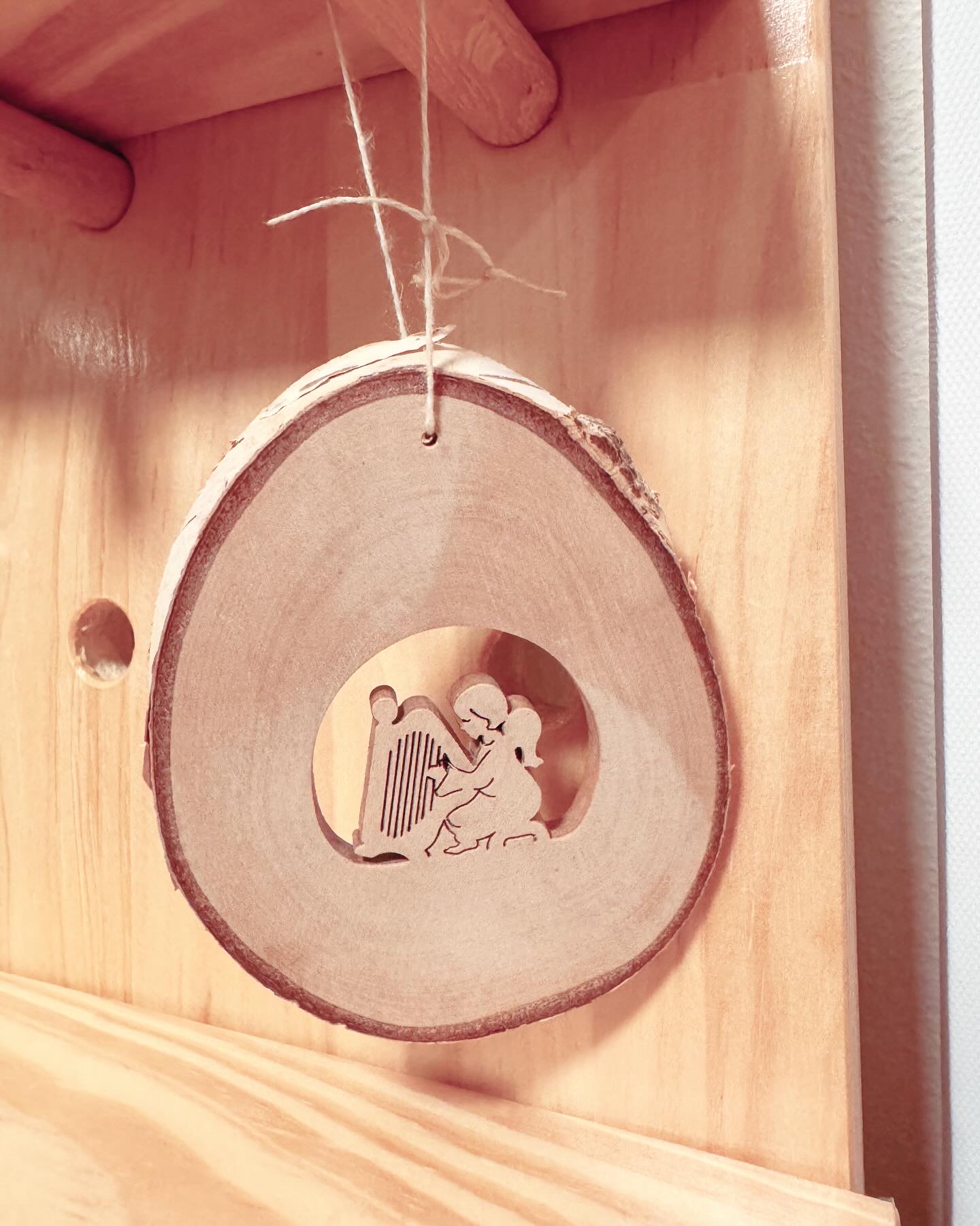 A Dreamy Yard for Laundry - Wooden shelf, circular cutout, wooden pegs, rustic design, wooden wall, wooden shelf knob, wooden