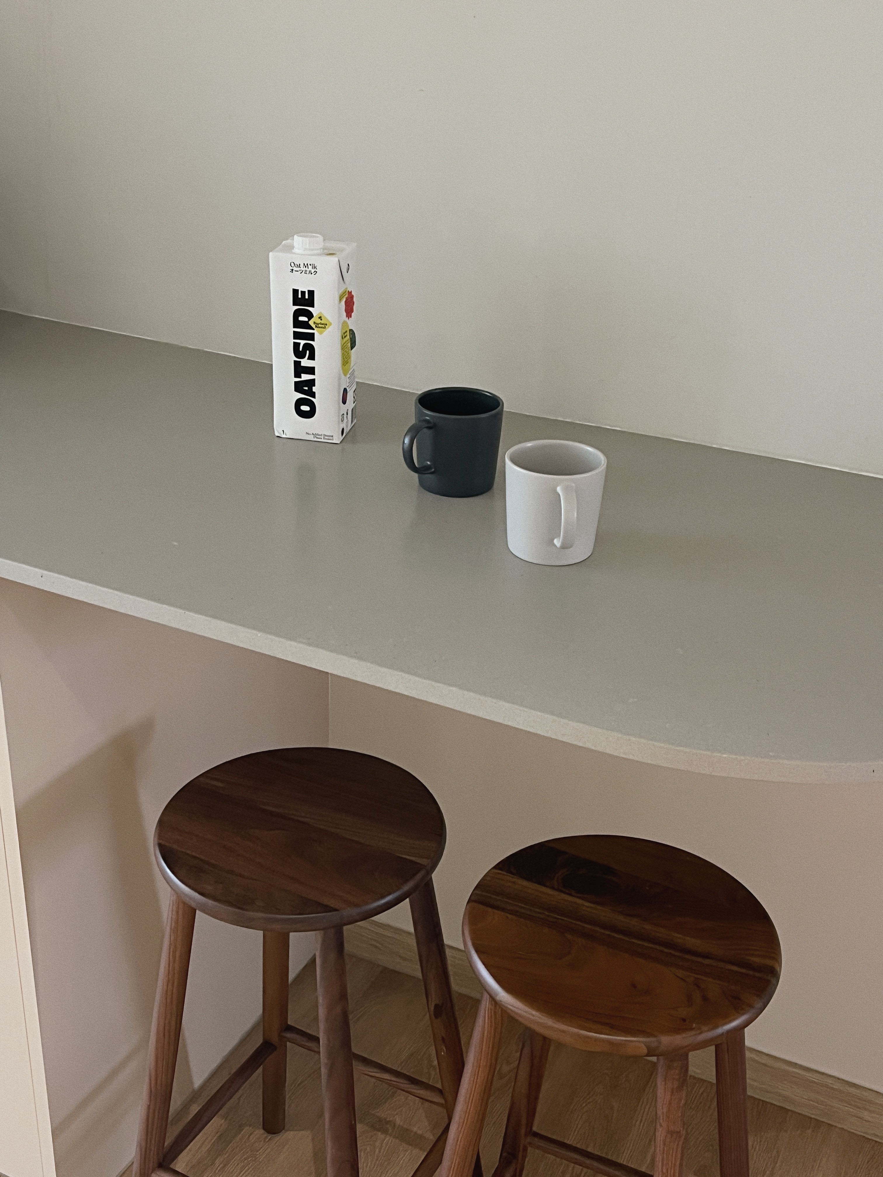 Scandi Kitchen - Keeping it minimal & light - Oatsippe carton, minimalist design, wooden stools, modern kitchen counter, two
