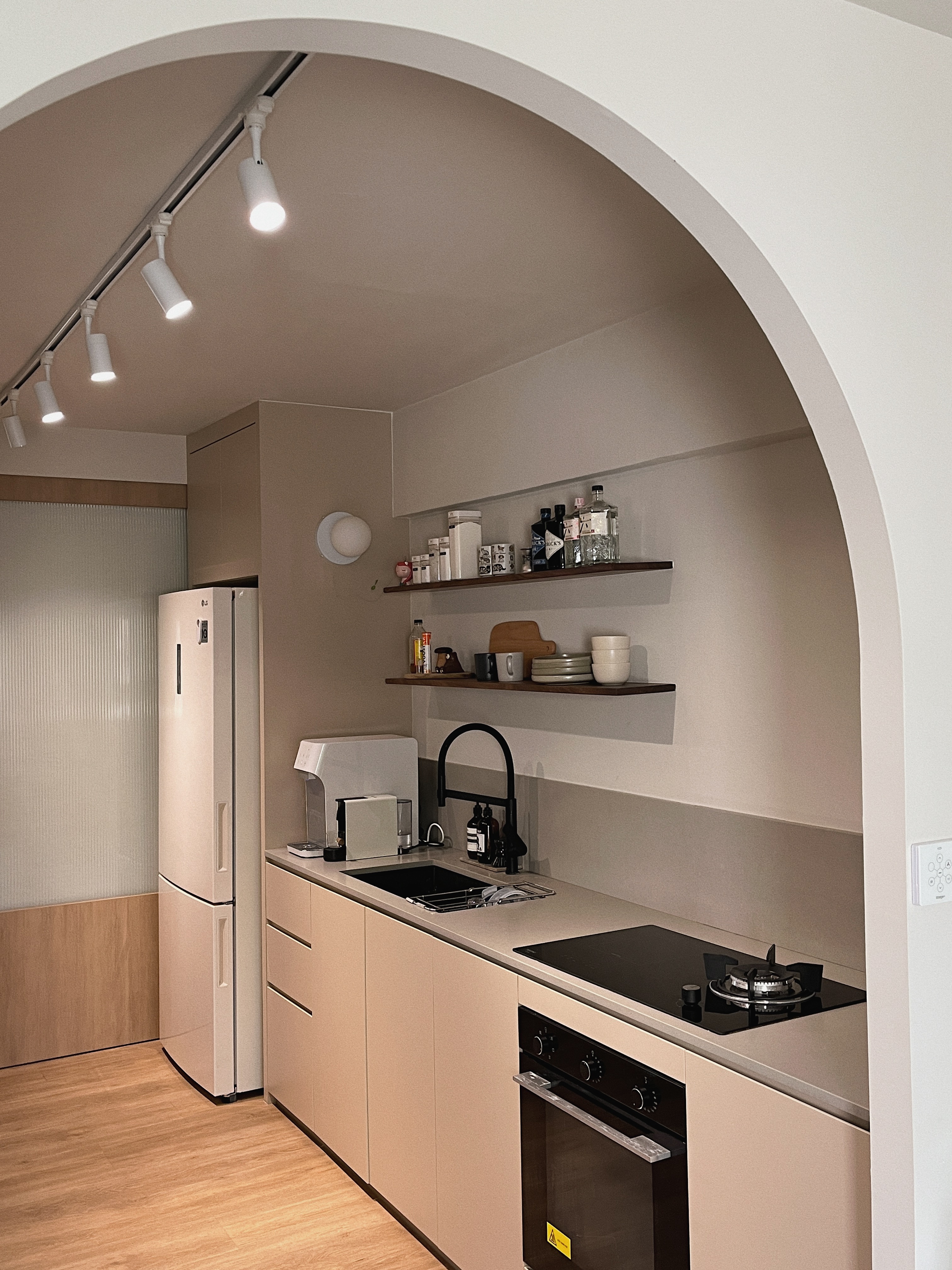 Scandi Kitchen - Keeping it minimal & light - Modern kitchen with integrated appliances, beige cabinets, sleek design