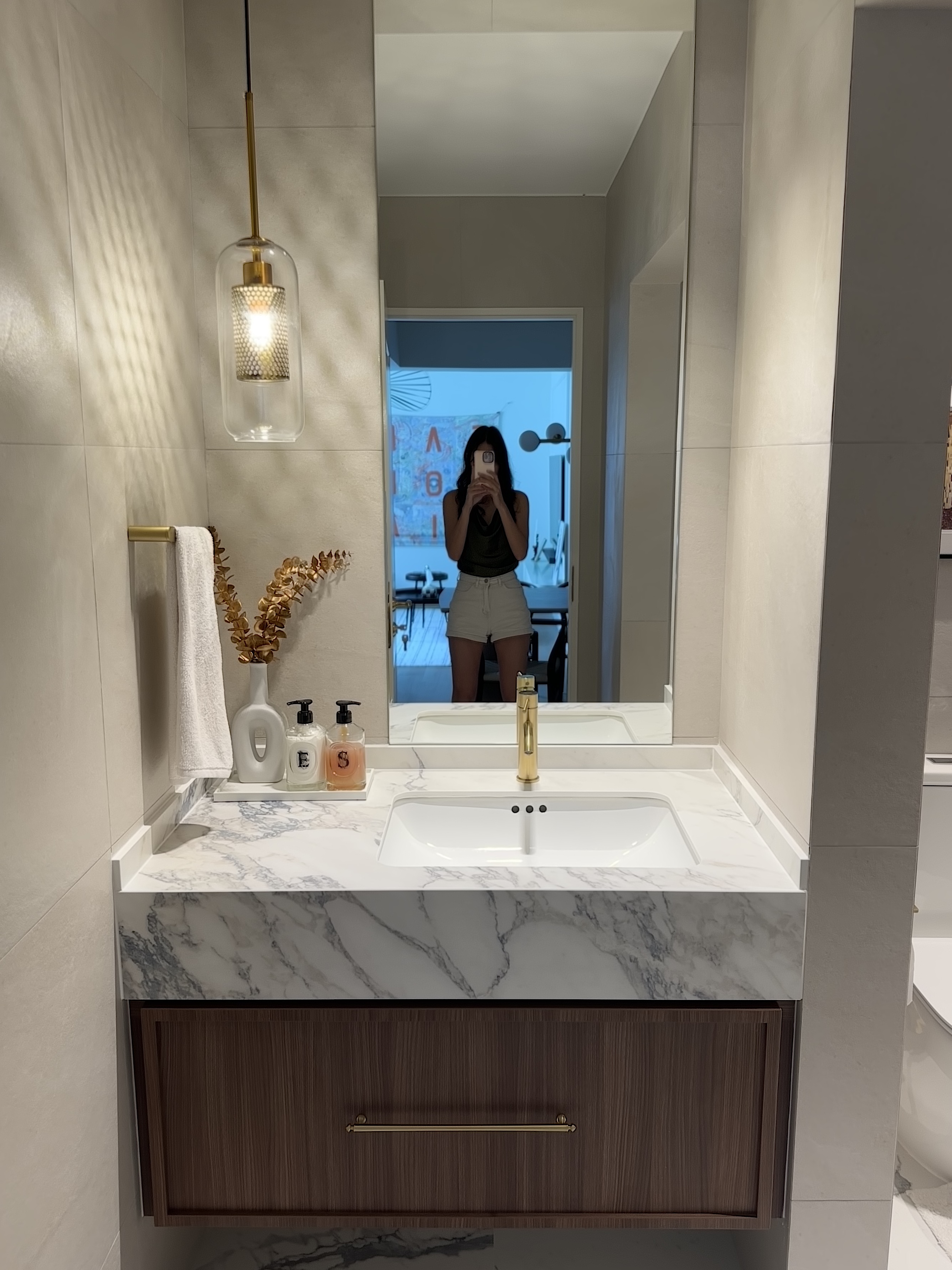 Our own unique blend of Parisian Chic & Urban NYC - Modern bathroom vanity, sleek design, marble countertop, gold faucet