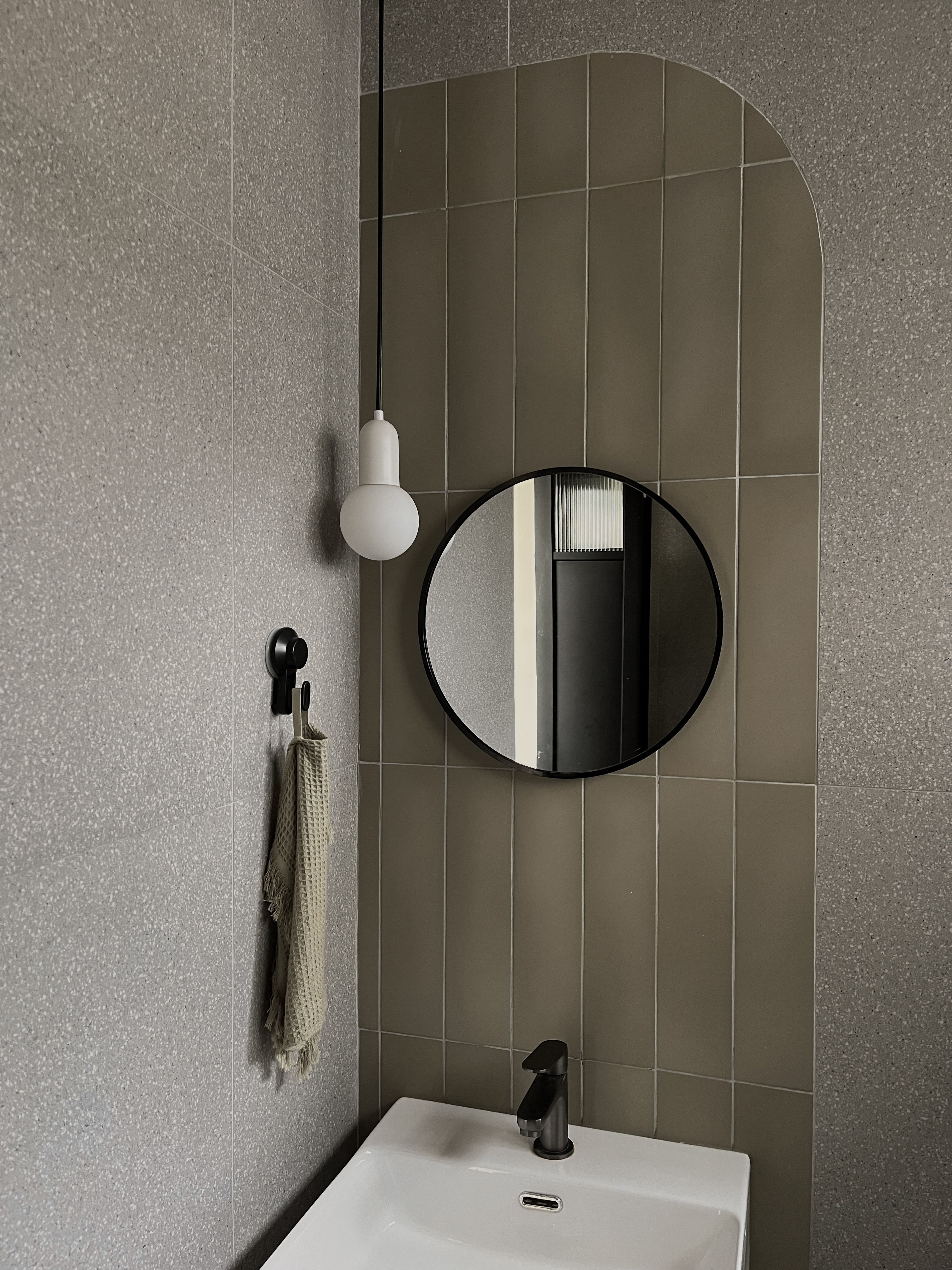 Bathroom - Relaxing Hotel Vibe (Pretty in Pink 🩷) - Gray tiled wall, modern bathroom, white sink, black faucet, arched