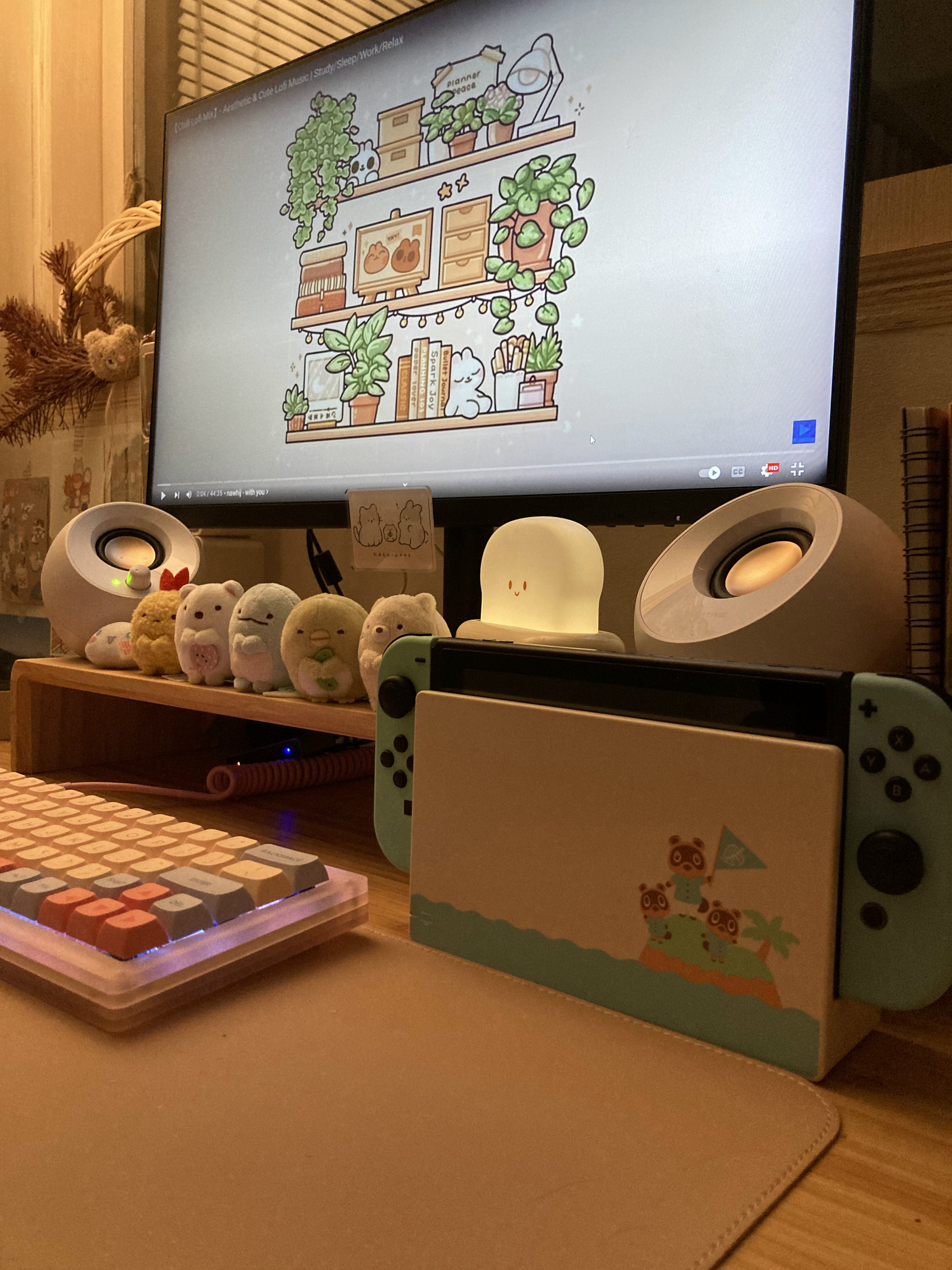 Creating a cosy corner with the things you love most - Cute and playful decor, plush toys, gaming console, keyboard with RGB