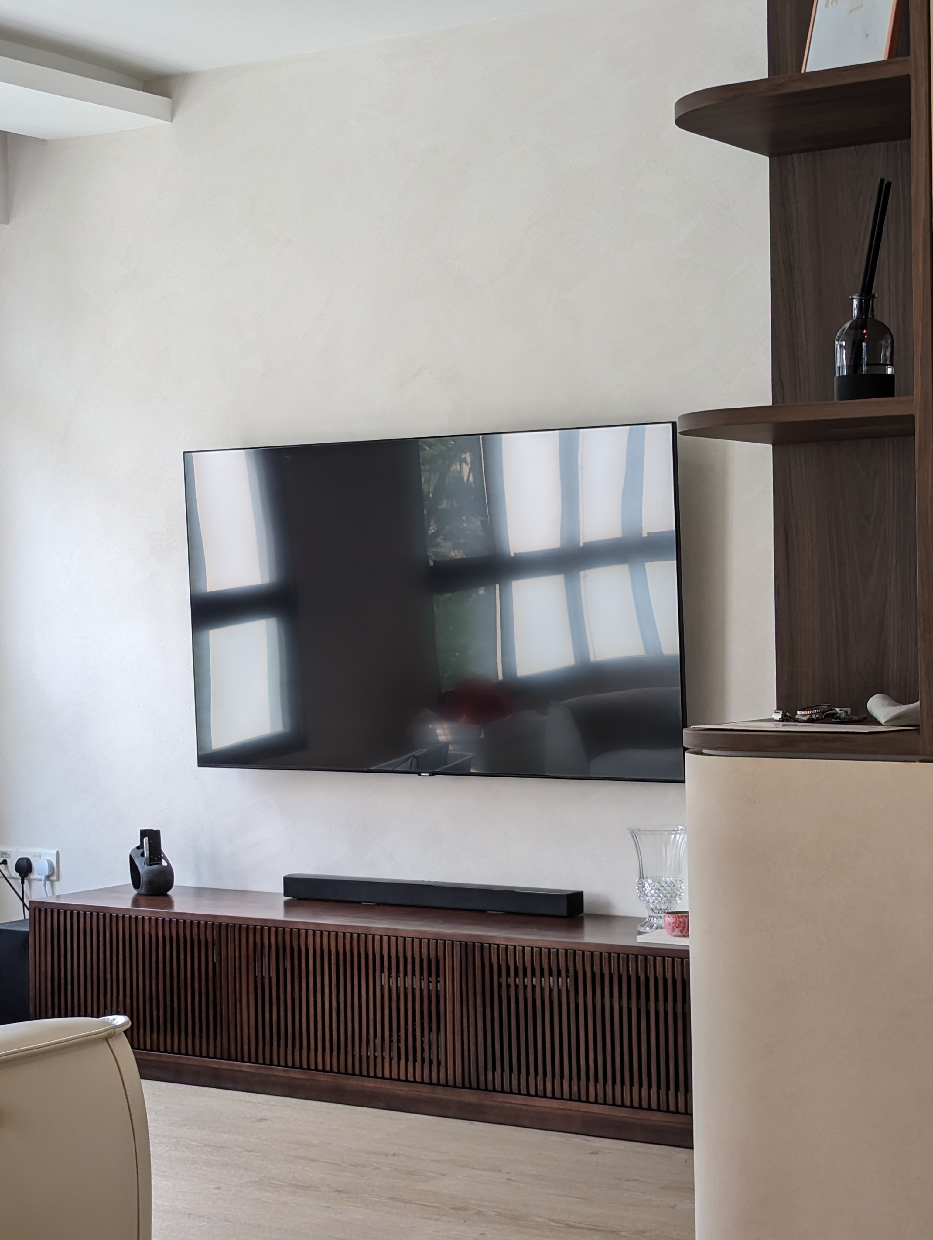 When function meets aesthetics  - Modern living room, minimalist decor, sleek television, large flat-screen, wooden console