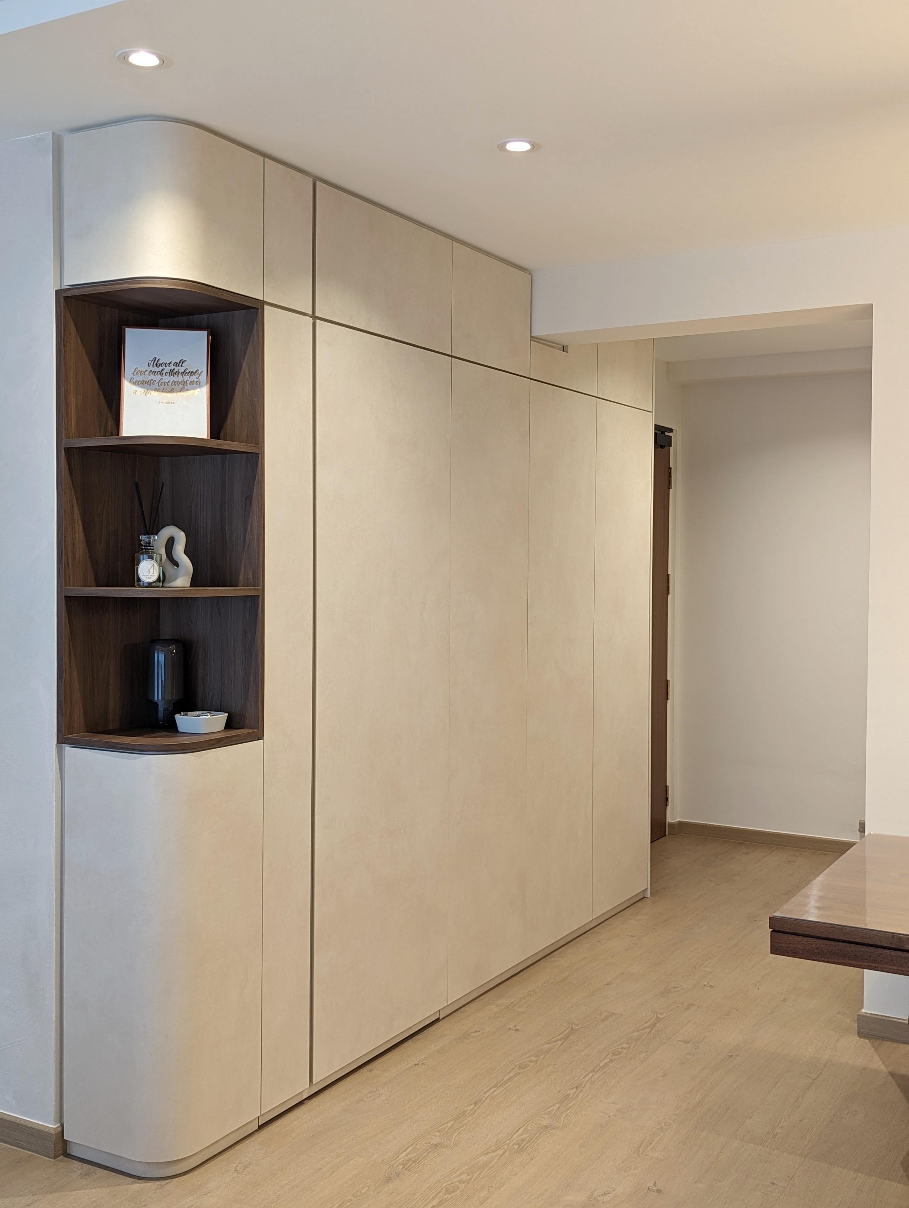 When function meets aesthetics  - Light beige wooden cabinets, recessed ceiling lights, minimalist design, modern aesthetic