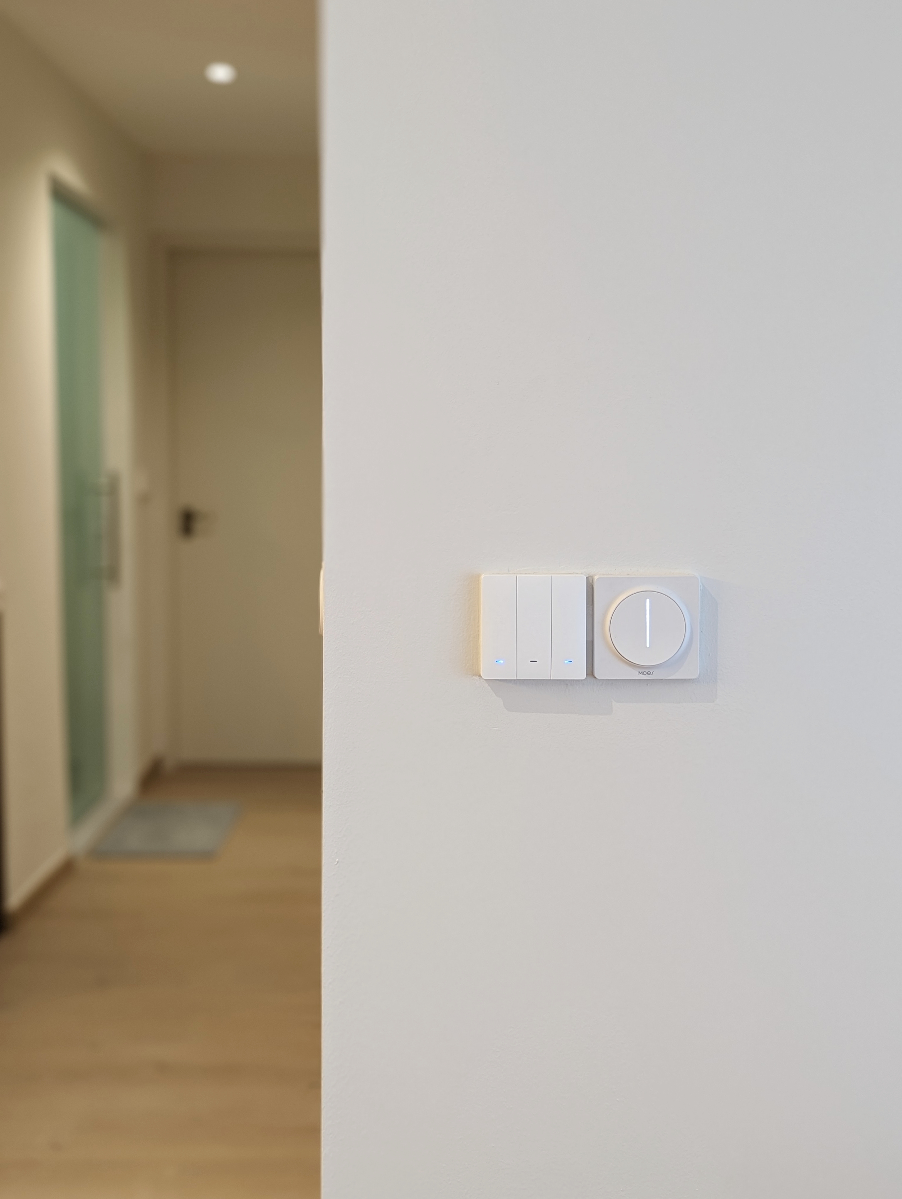 When function meets aesthetics  - Smart home control panel, modern wall-mounted thermostat, white control box, blue LED